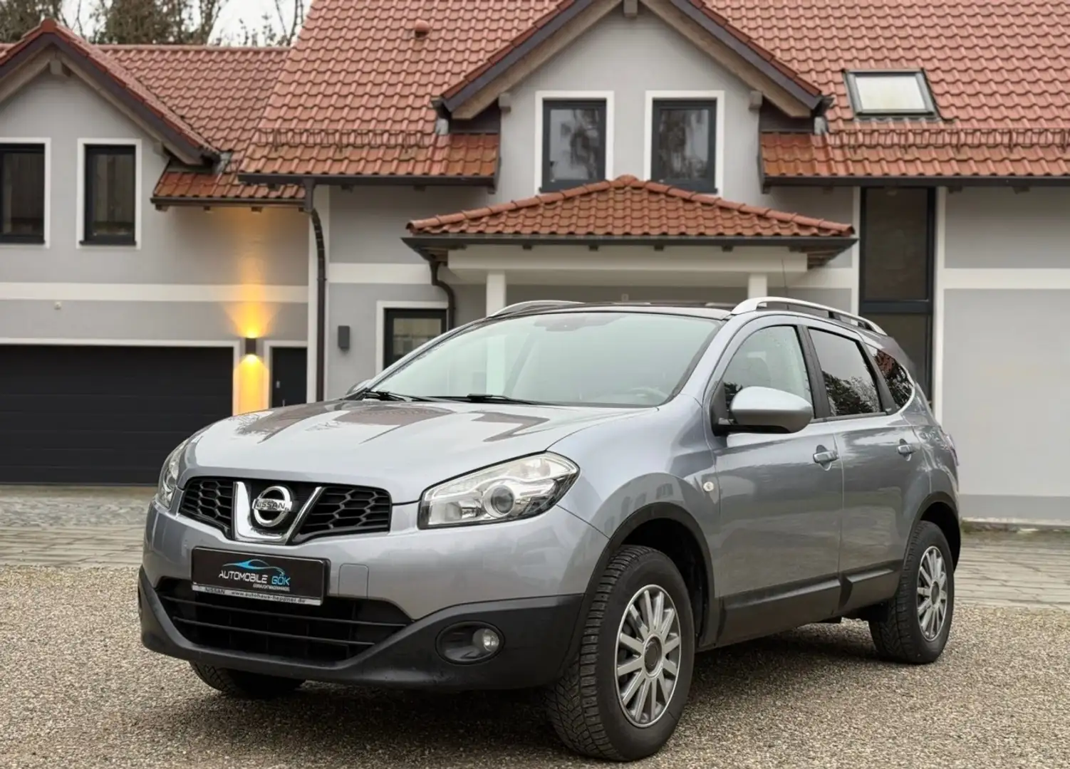 Nissan Qashqai+2 2.0 Acenta *KLIMAAUTOM.*7-SITZER*PANORAMA*NAVI*AHK Gris - 1