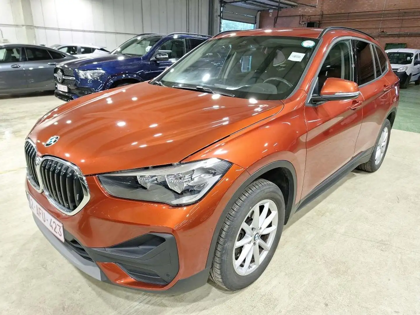 BMW X1 18dA SDrive *CUIR-NAVI PRO-CRUISE-PARKING AV&AR* Oranje - 2