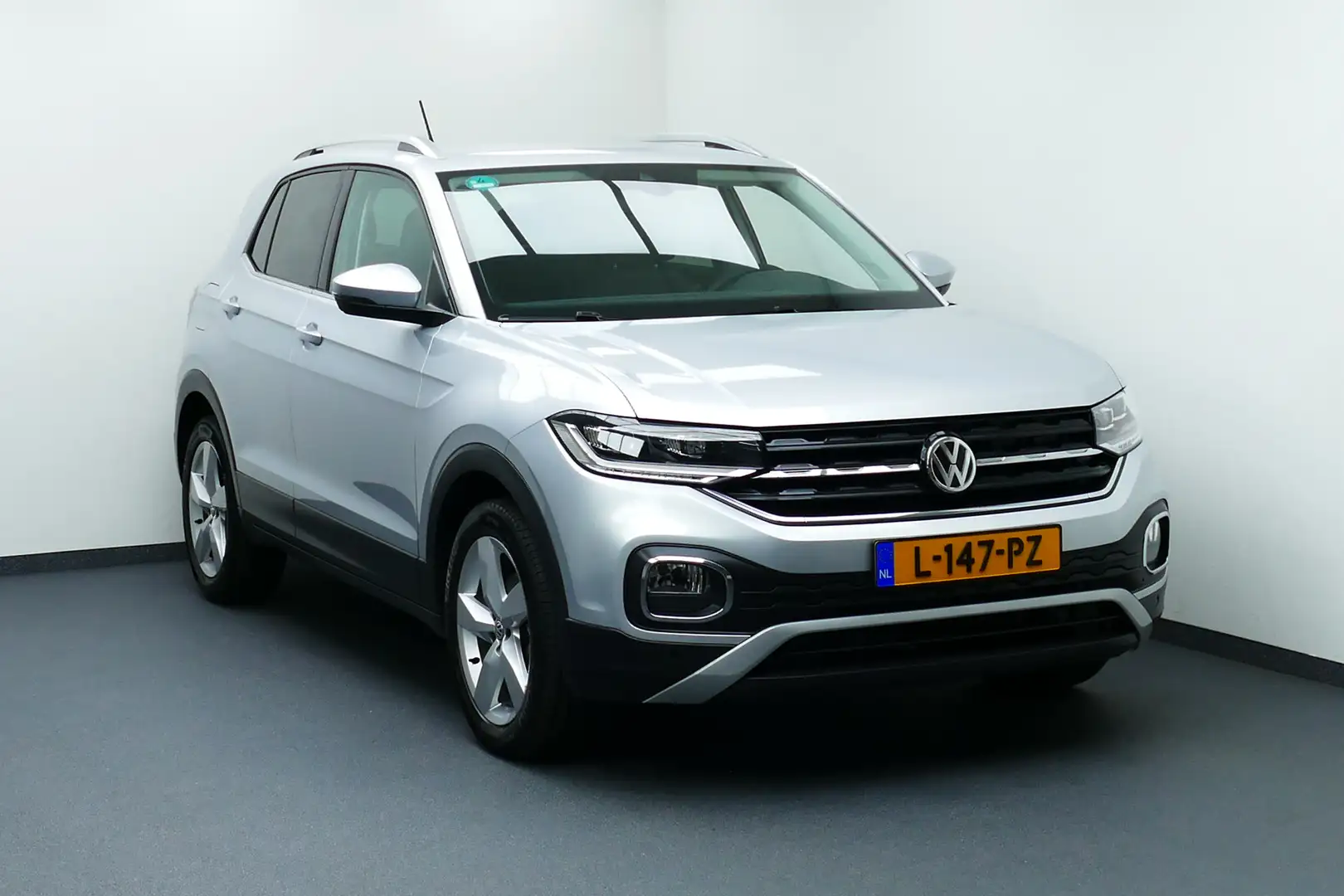 Volkswagen T-Cross 1.0 TSI Style. Adaptief Cruise, Navi, StoelVerw, P Grijs - 1