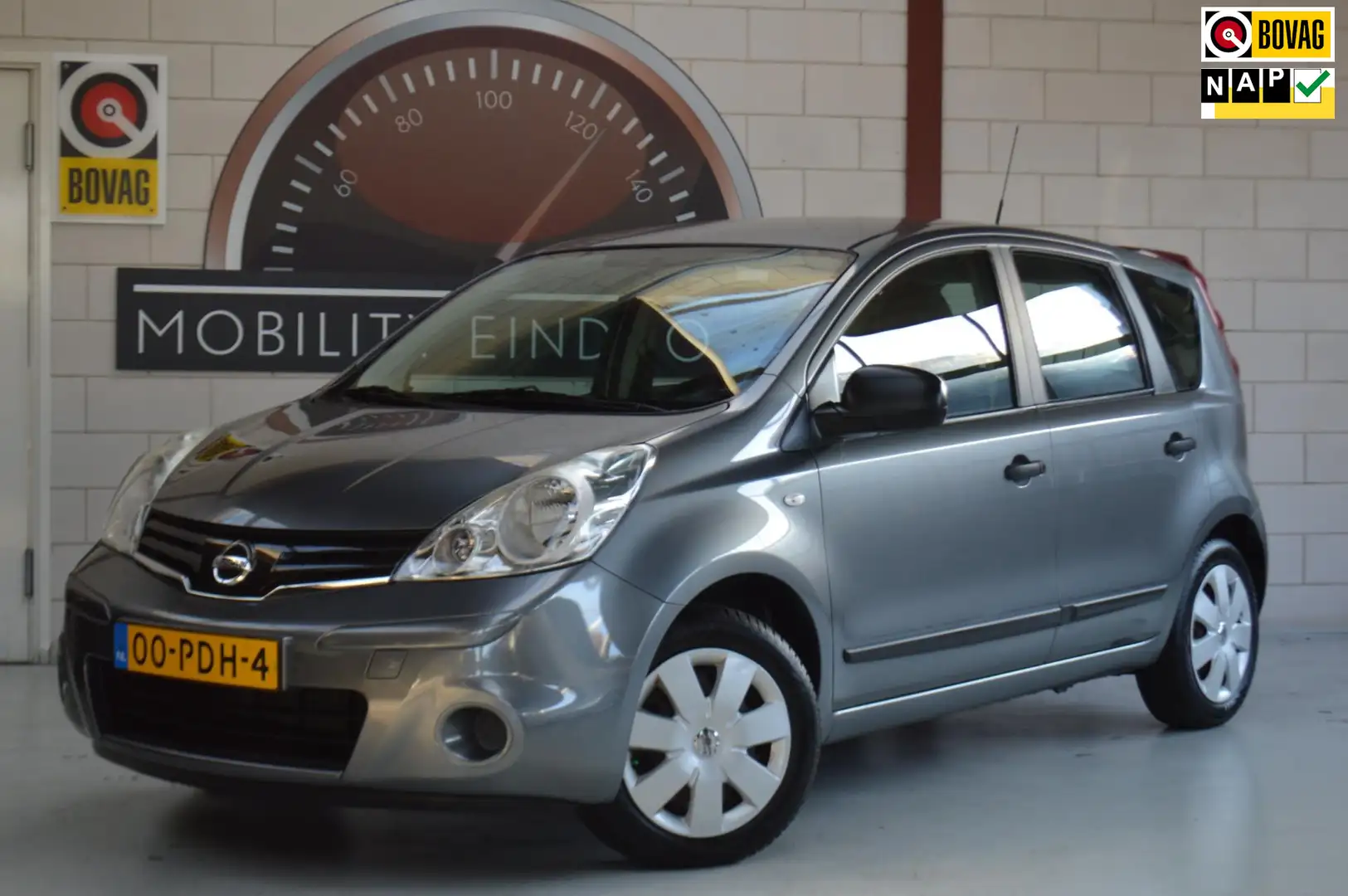 Nissan Note 1.4 Visia, All-Season banden, Trekhaak, Airco, APK Grau - 1