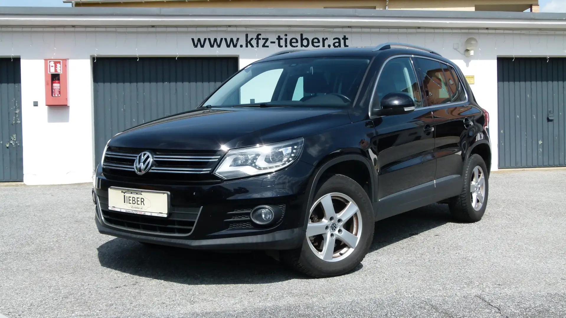 Volkswagen Tiguan Sport 2,0 TDI *1.BESITZ*XENON*ÖAMTC PICKERL* Noir - 1