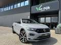 Volkswagen T-Roc Cabrio 1.5 TSI R-Line Leer Trekhaak Beats Navi Cam Grijs - thumbnail 1