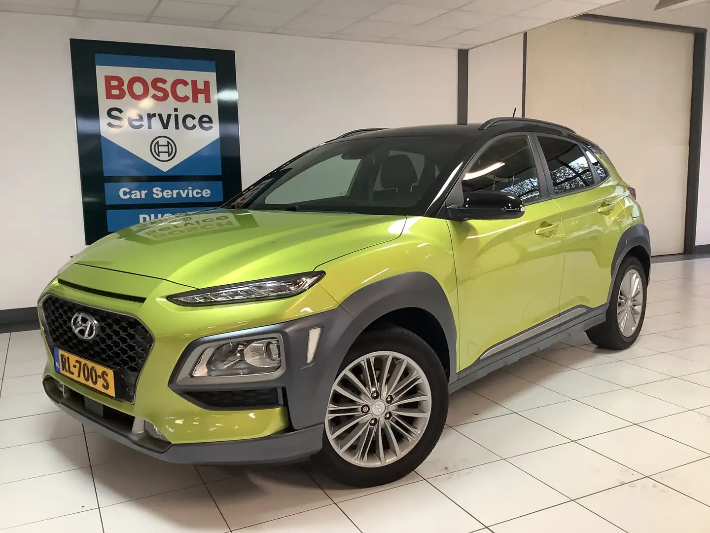 Hyundai KONA 1.0T Fashion met trekhaak en dealer onderhouden Groen - 1
