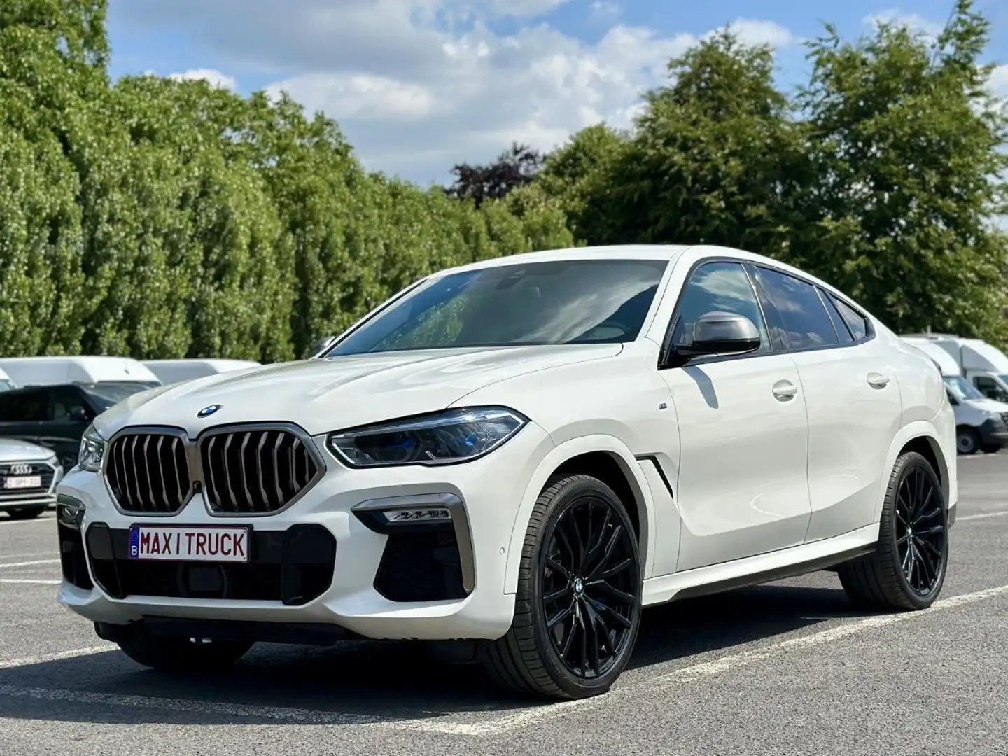 BMW X6 M50 d(=400PK/CH)- 49.000€- Leasing 1.580€/M Blanc - 1