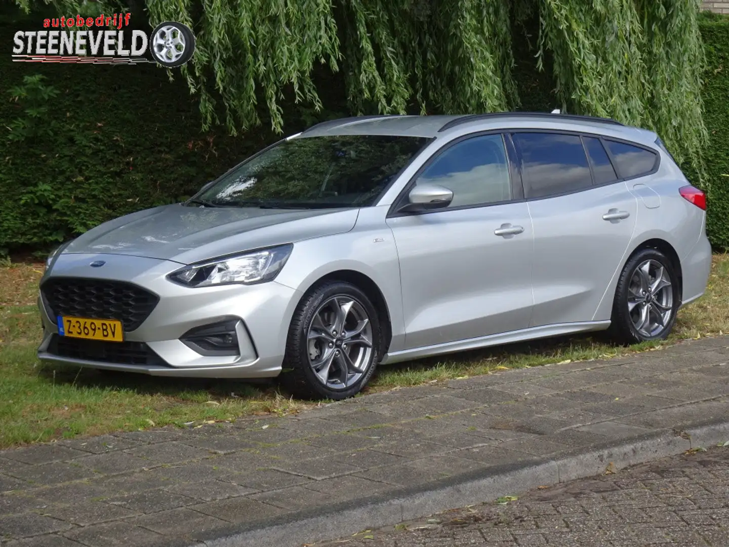 Ford Focus Wagon 1.0 125pk Hybrid ST-Line met Navi en WinterP Gris - 1