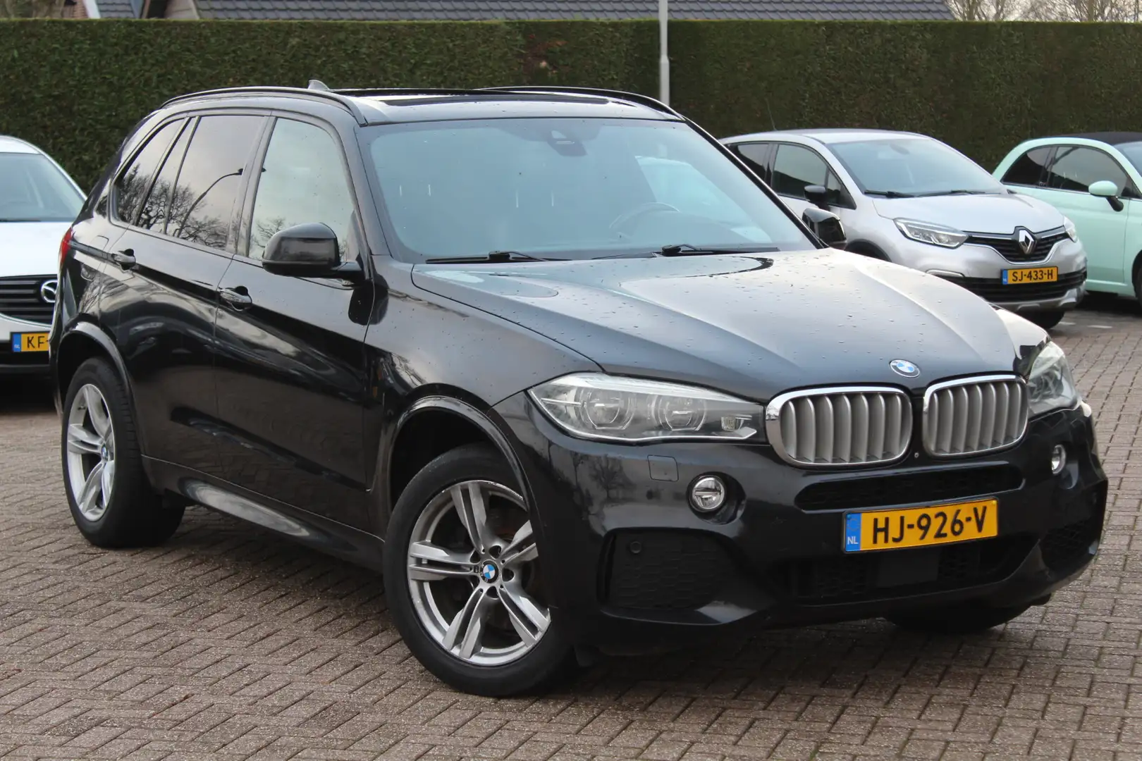BMW X5 xDrive40e High Exe. M Sport / Trekhaak / Panoramad Zwart - 1