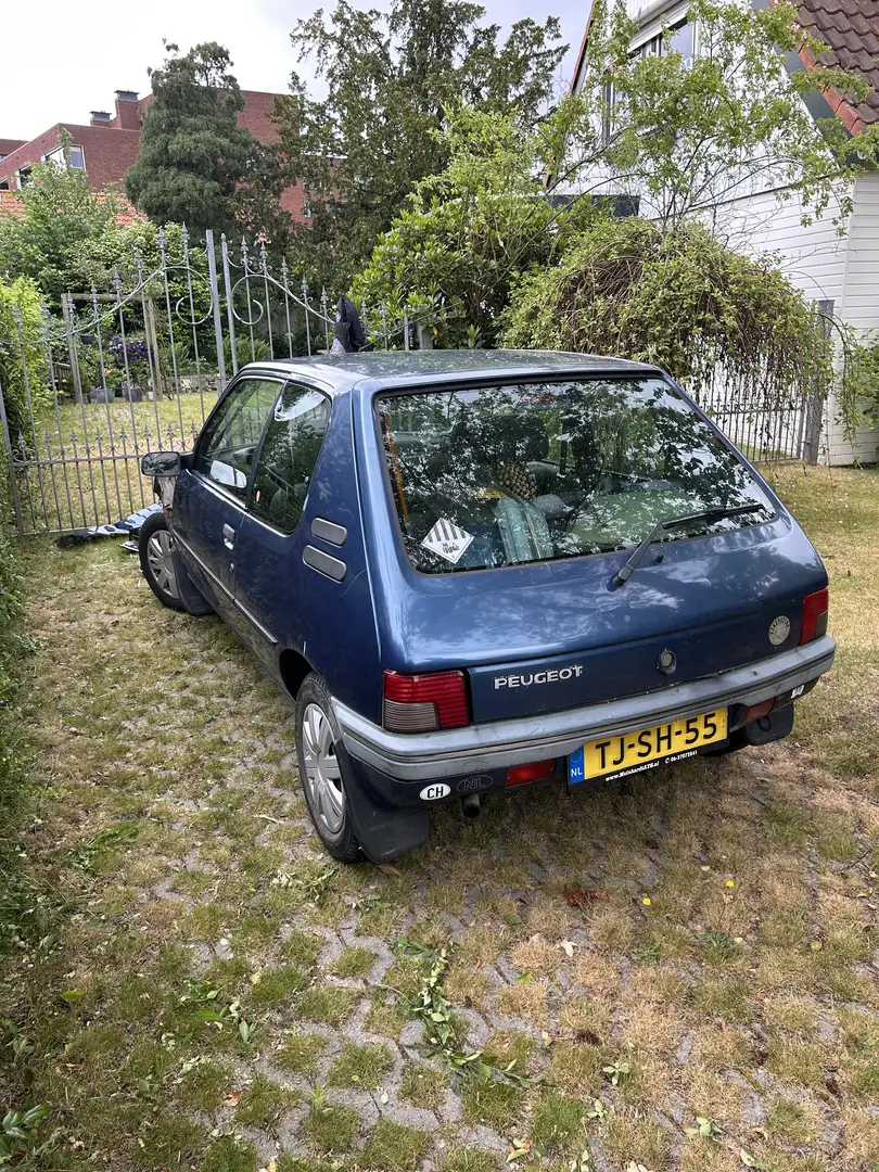 Peugeot 205 1.4 generation (1998) - motor loopt Blauw - 1
