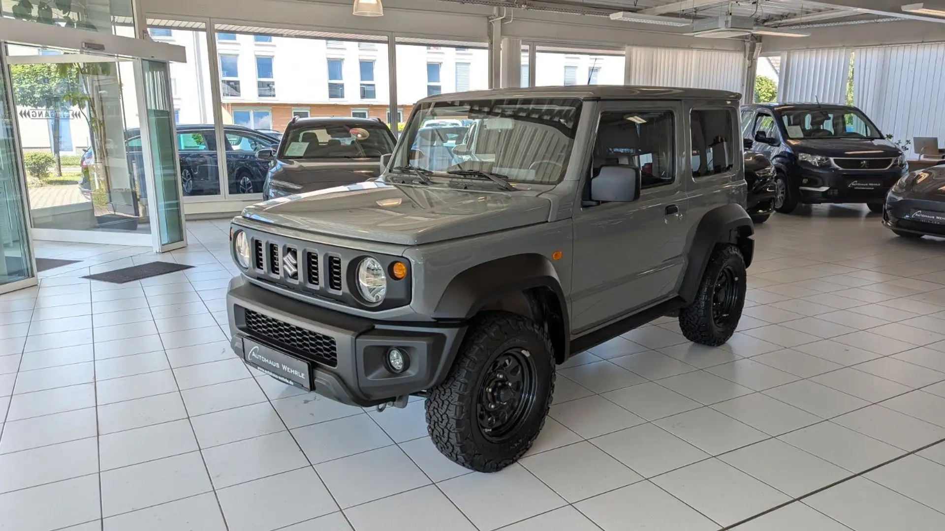 Suzuki Jimny 1.5 Allgrip Comfort *AHK*BF Goodrich* Grau - 1