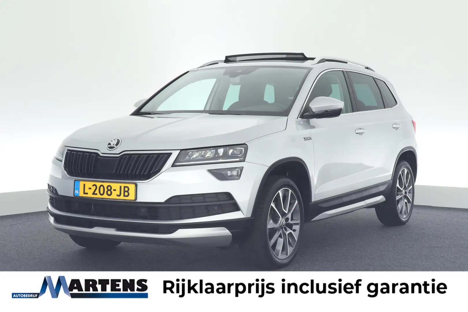 Skoda Karoq 1.5 TSI 150pk DSG ACT Scout Camera Keyless Stoelve Grijs - 1
