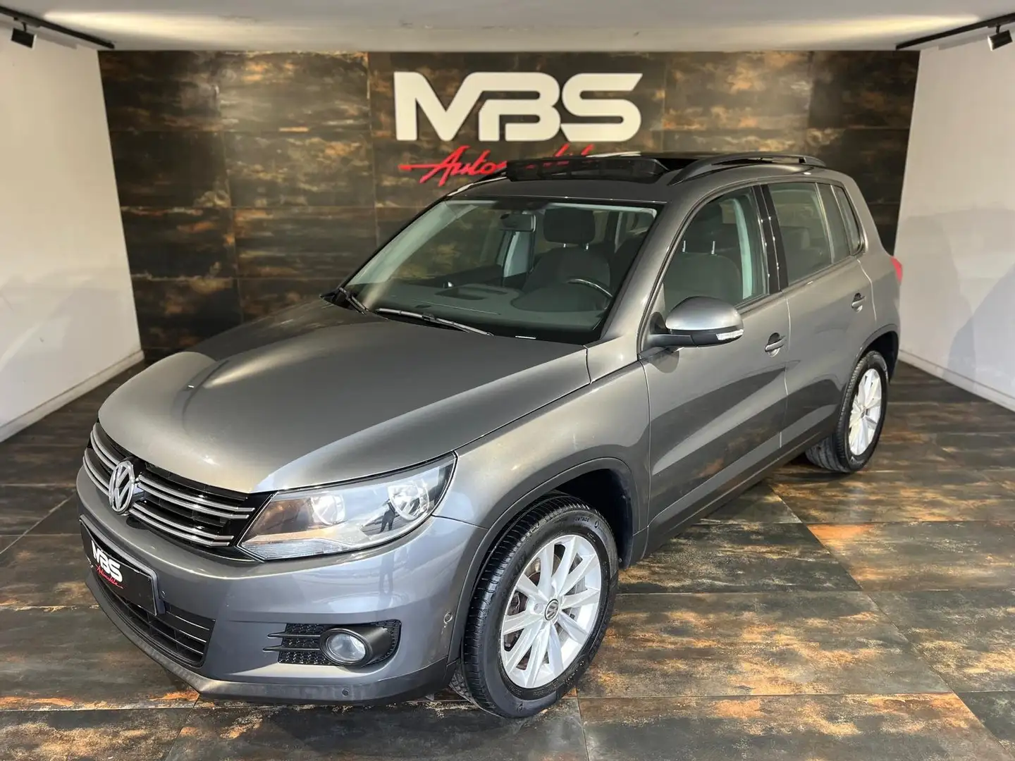 Volkswagen Tiguan 1.4 TSI Sport * GPS * TOIT OUVRANT * CLIM-BIZONE Gris - 1