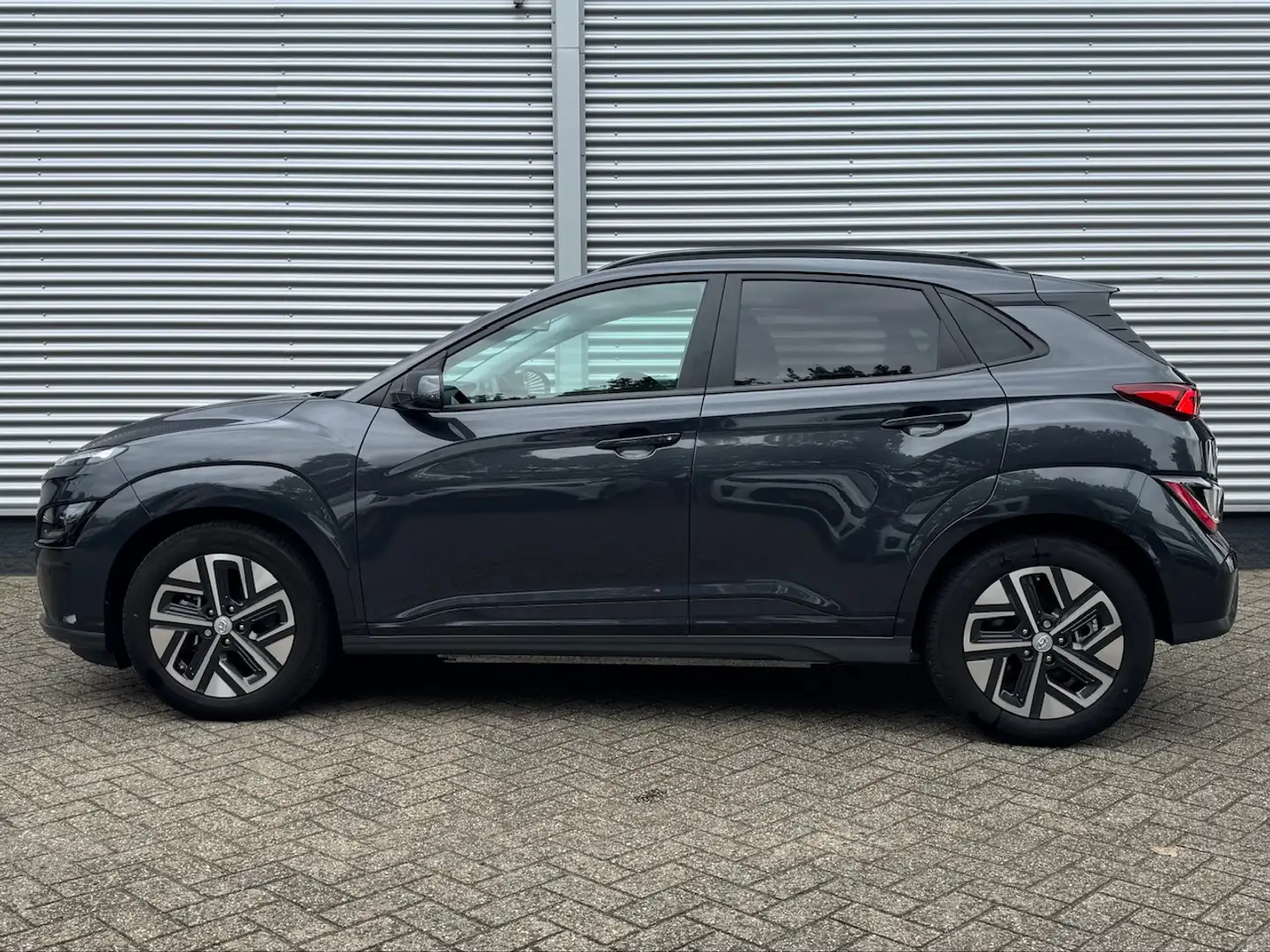 Hyundai KONA EV 136pk 2WD Automaat Fashion | Krell | Head Up Di Grijs - 2