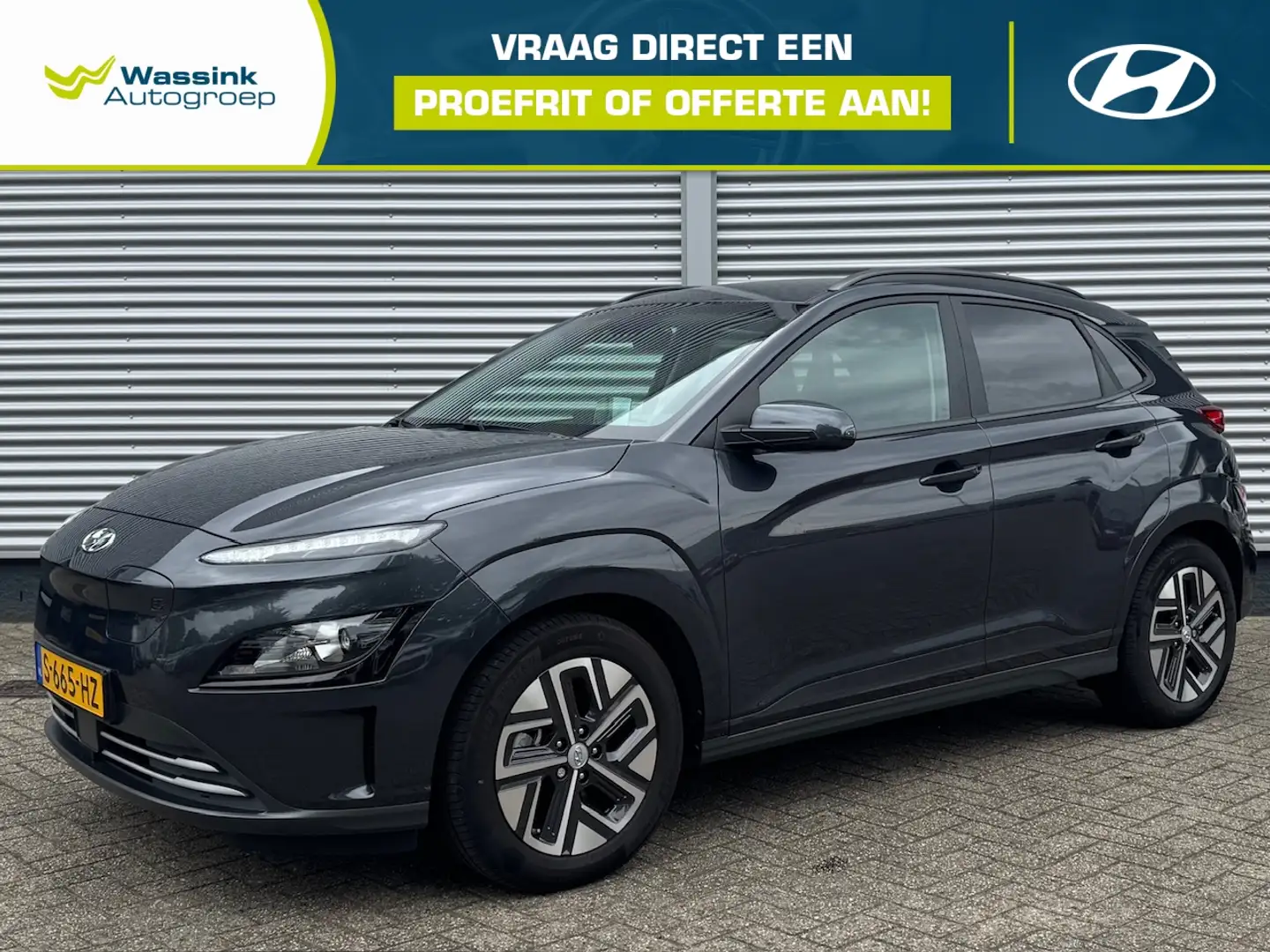 Hyundai KONA EV 136pk 2WD Automaat Fashion | Krell | Head Up Di Grijs - 1
