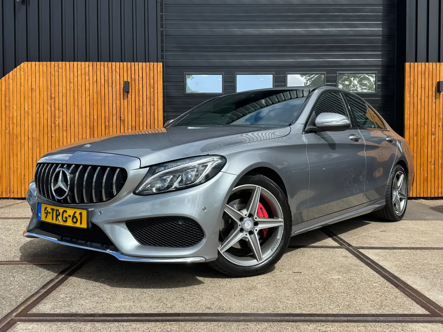 Mercedes-Benz C 200 AMG line Cruise Clima Navi Leder Grijs - 1