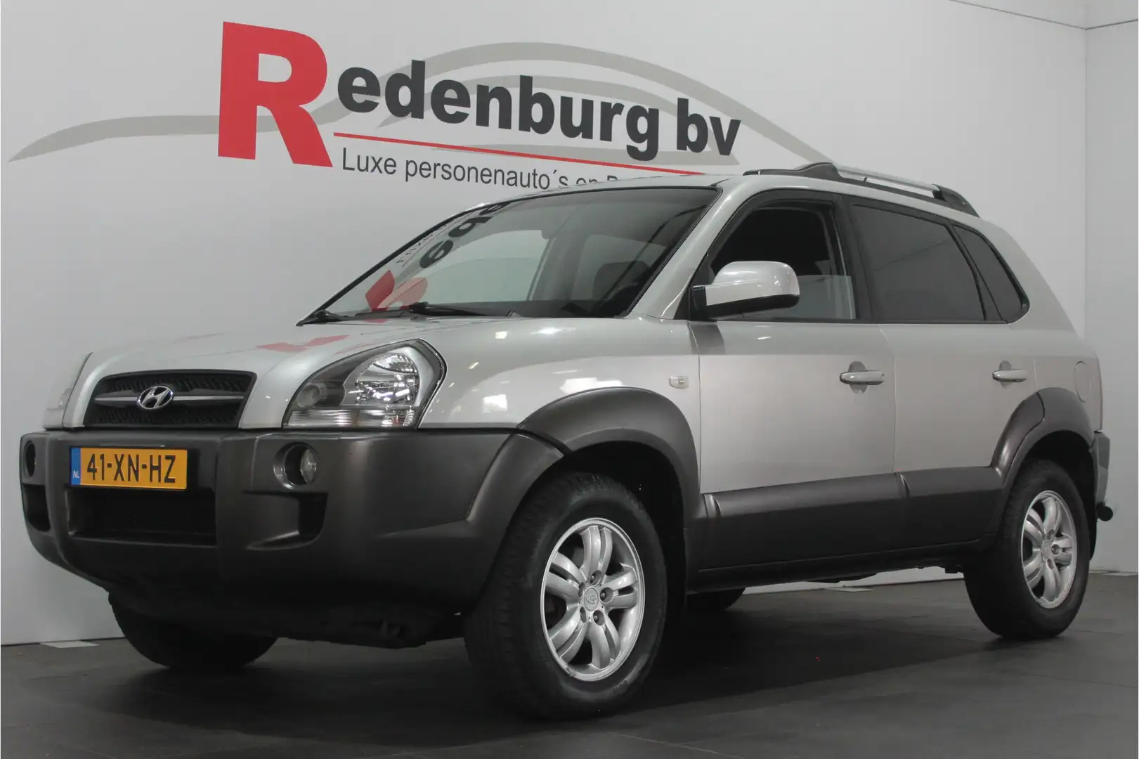 Hyundai TUCSON 2.0i Style Premium - Airco / Cruise / Stoelverw. Grijs - 1