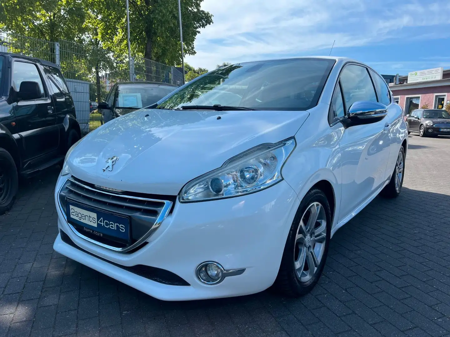 Peugeot 208 1.6 Allure°Garantie°Navi°PDC°SitzHZG° Weiß - 1