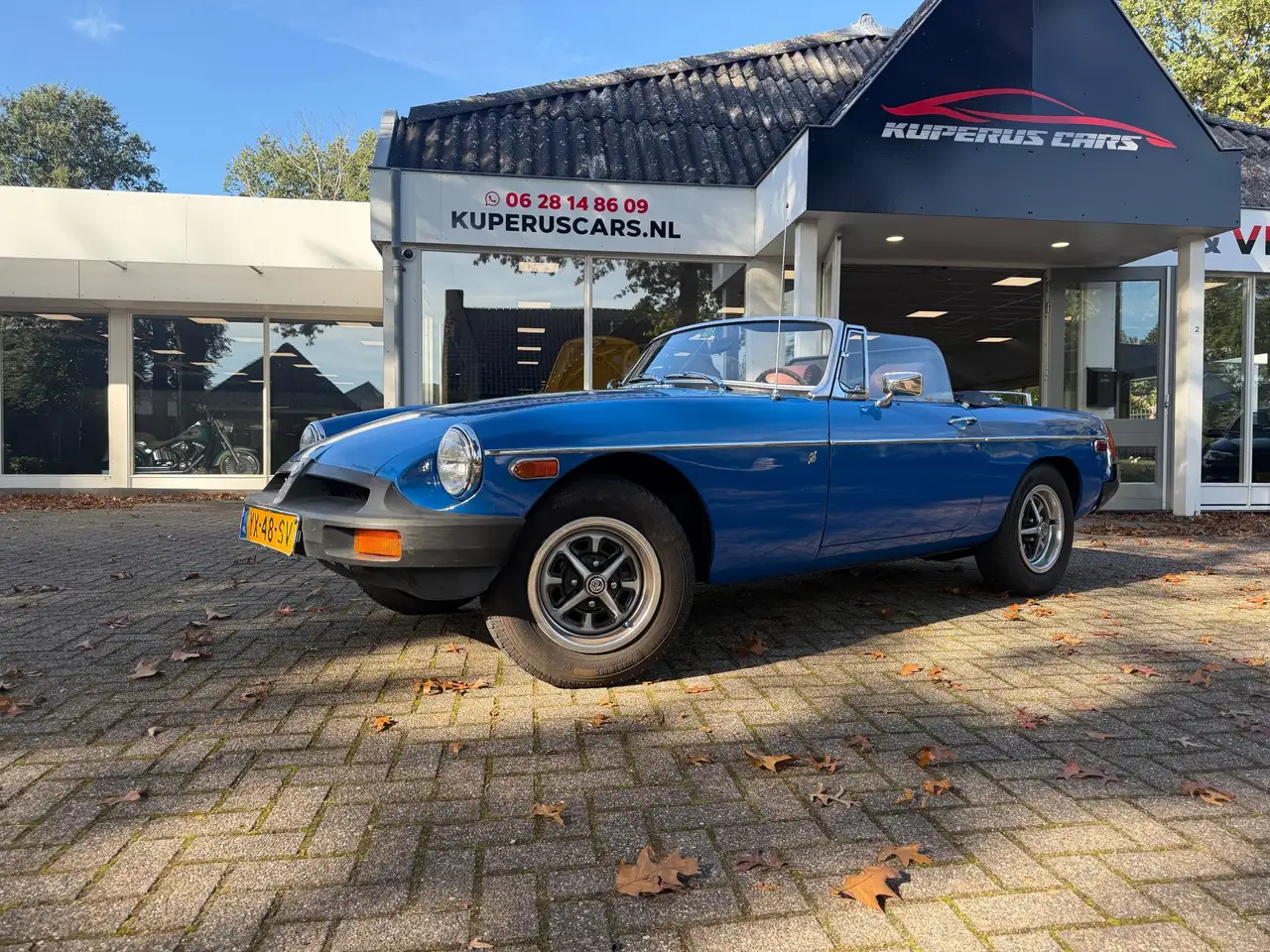 MG