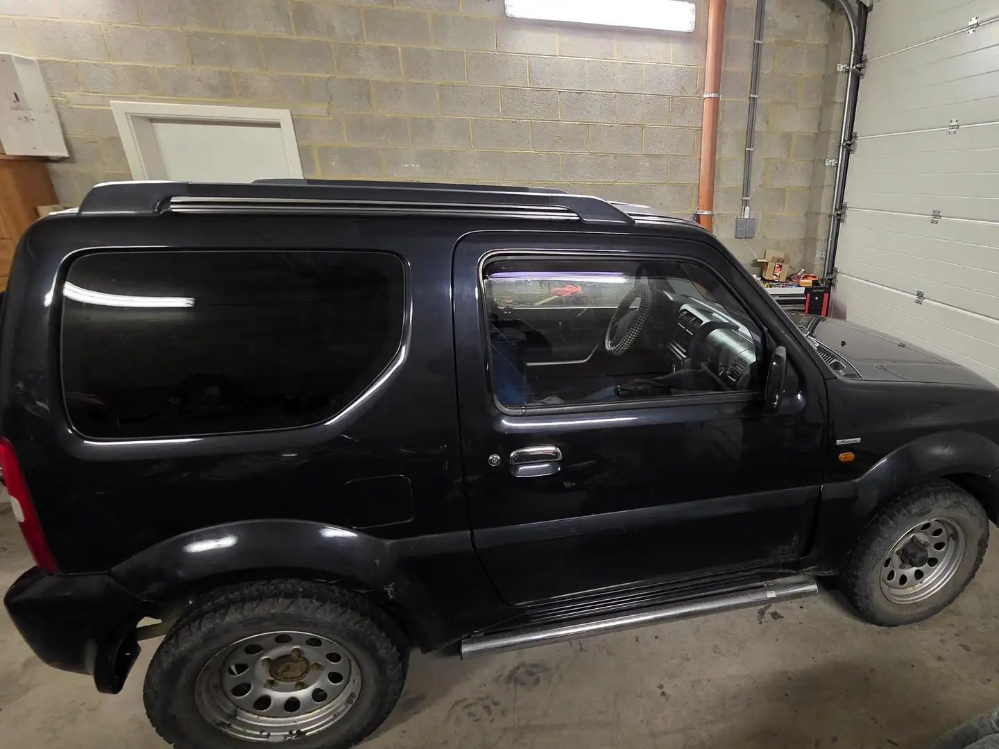 Suzuki Jimny Jimny 1.3i 16v JLX Fekete - 2