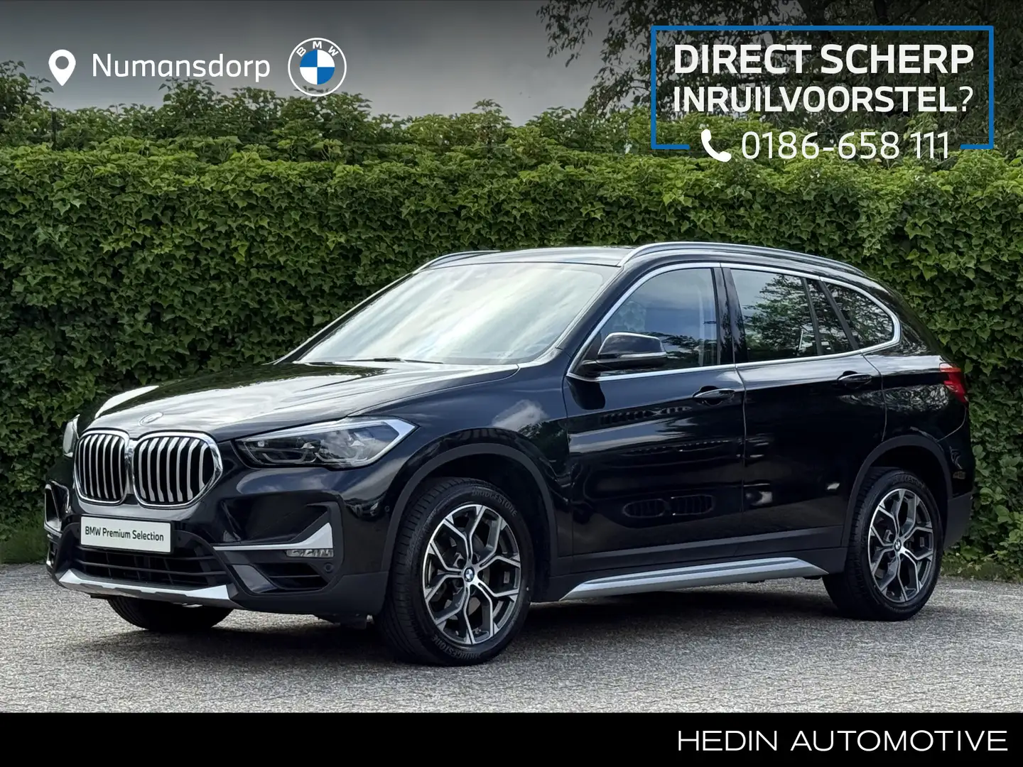 BMW X1 sDrive20i | High Exe | xLine | Head-Up | Camera | Zwart - 1