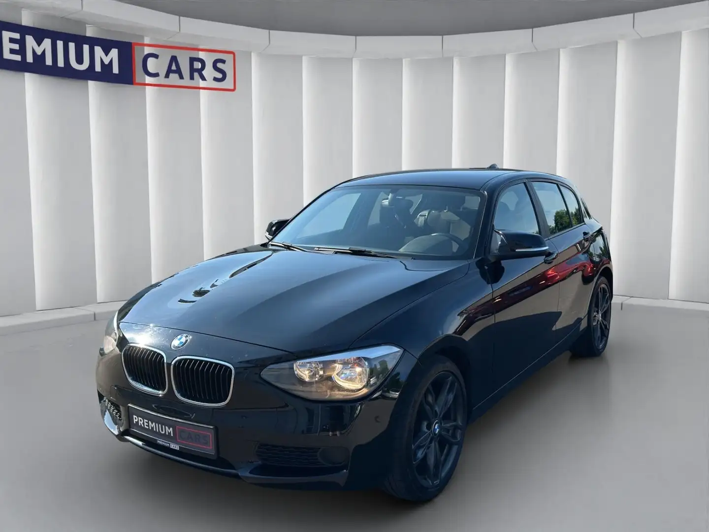BMW 114 i Lim. 5-trg. *Garantie*Finanzierung* Zwart - 1