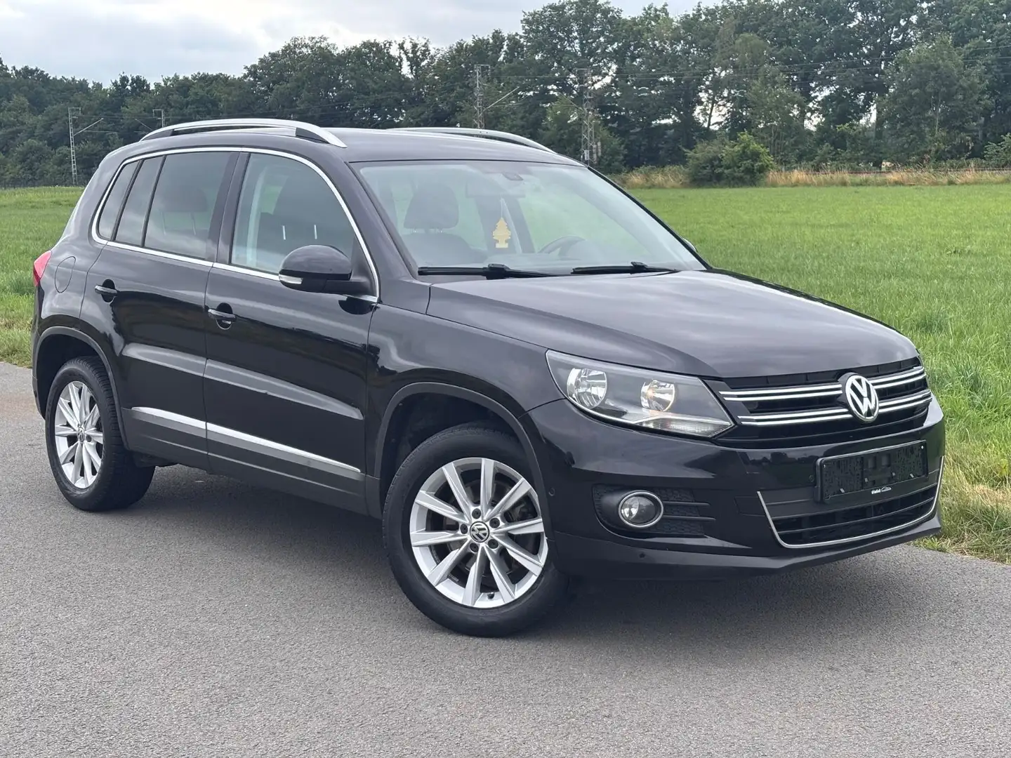 Volkswagen Tiguan 1,4 TSI Sport & Style-Navi-Eur5- Negro - 1
