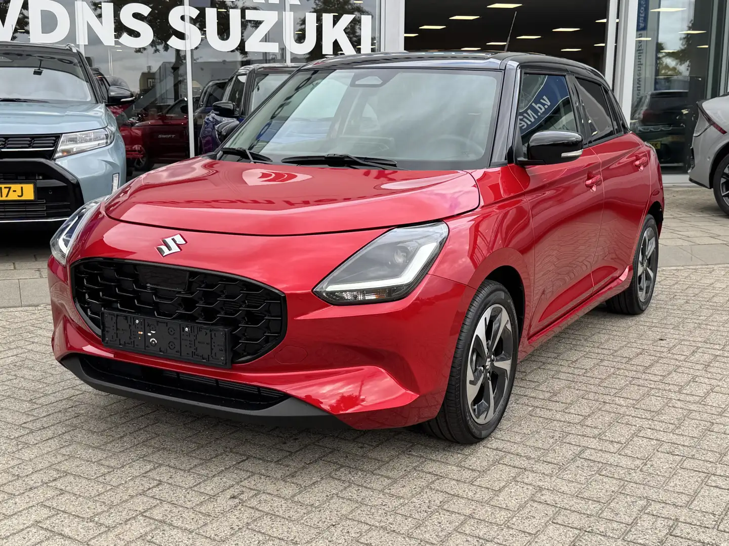 Suzuki Swift 1.2 Style Smart Hybrid info: M.Safari Rood - 2