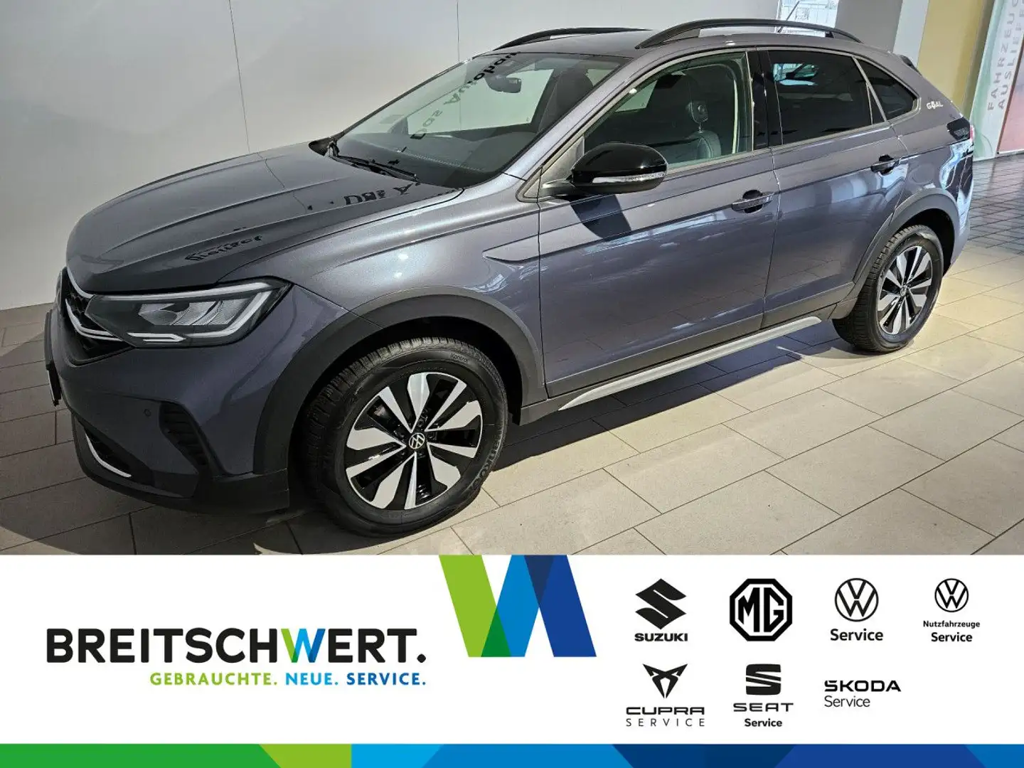 Volkswagen Taigo 1.0 TSI Goal DSG AHK LED Navi ACC RFK 5JGar Grijs - 1