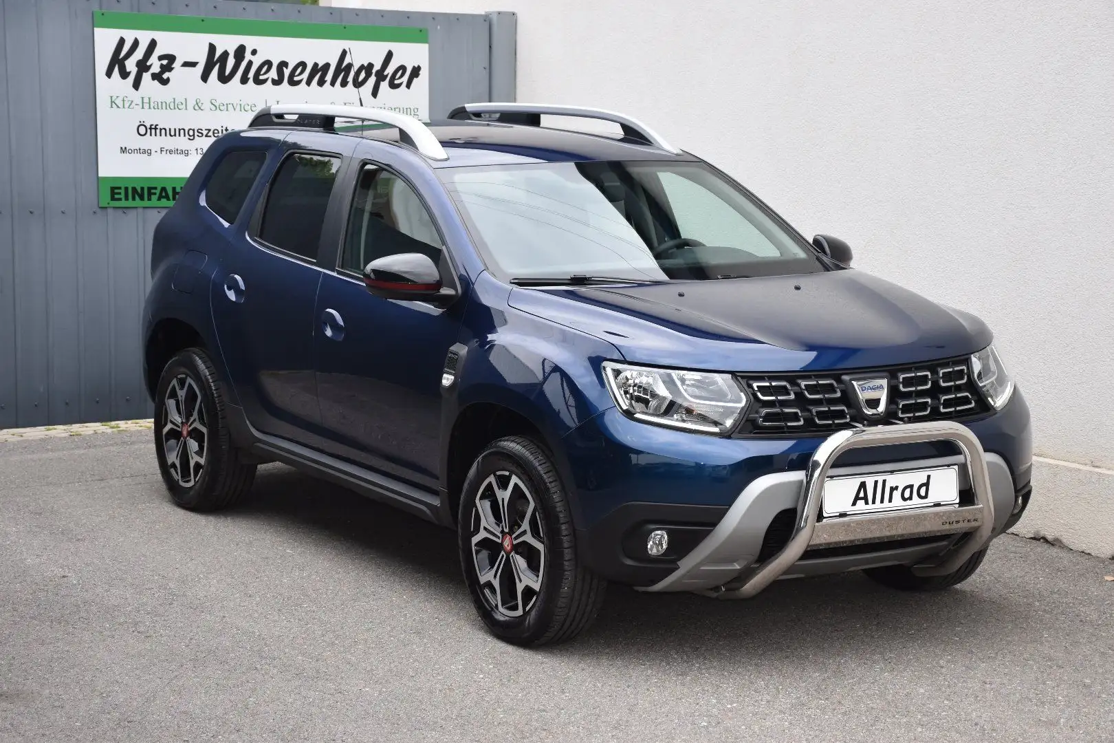 Dacia Duster II 1.6 SCe 115 Charisma 4WD / Service + Pickerl N Blau - 1