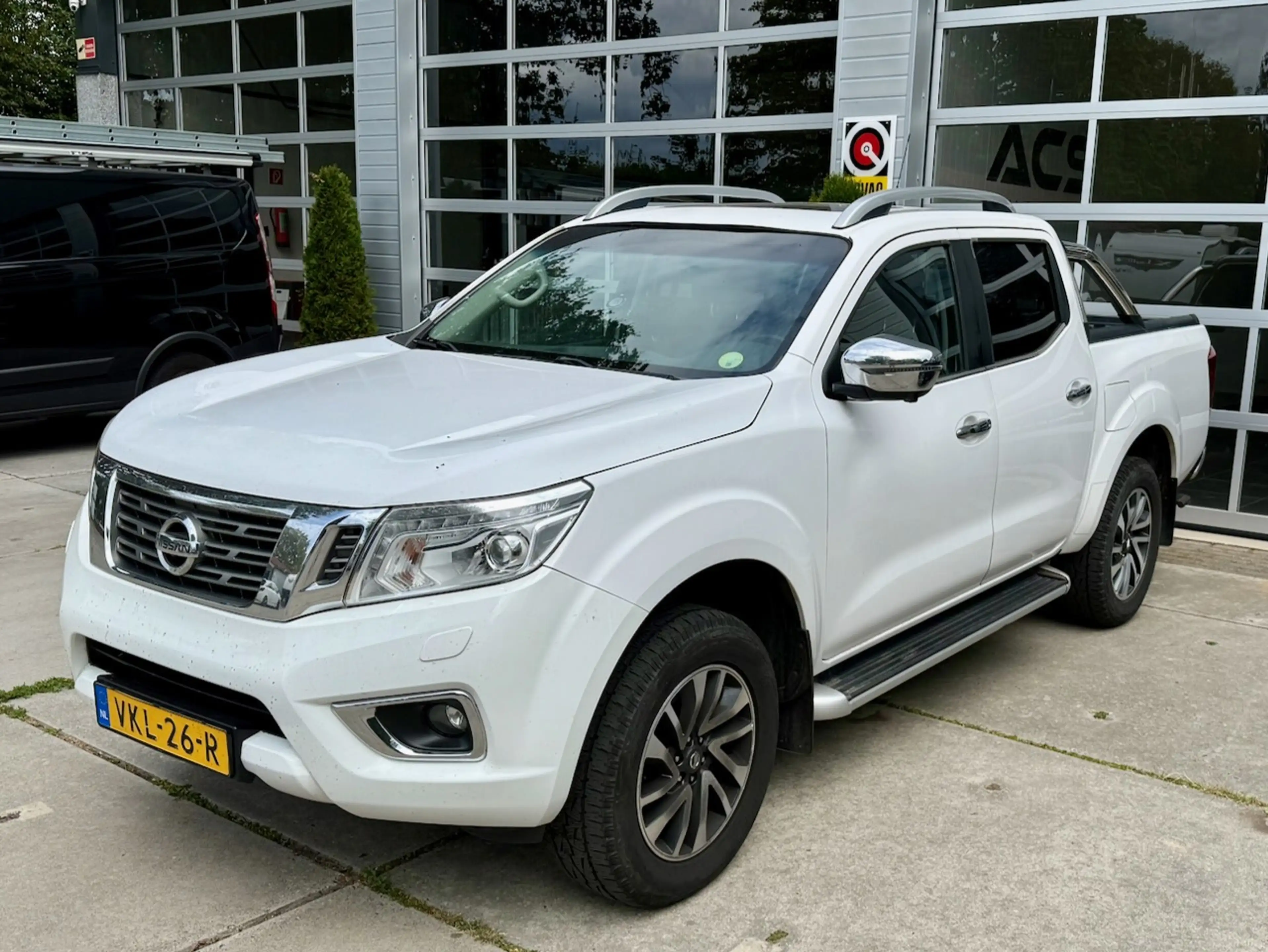 Nissan Navara 2.3 dCi Tekna DC (5-zitplaatsen) Snoeks — photo 2