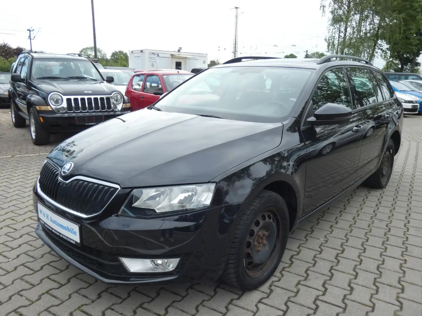 Skoda Octavia Combi Ambition 4x4 Negro - 1