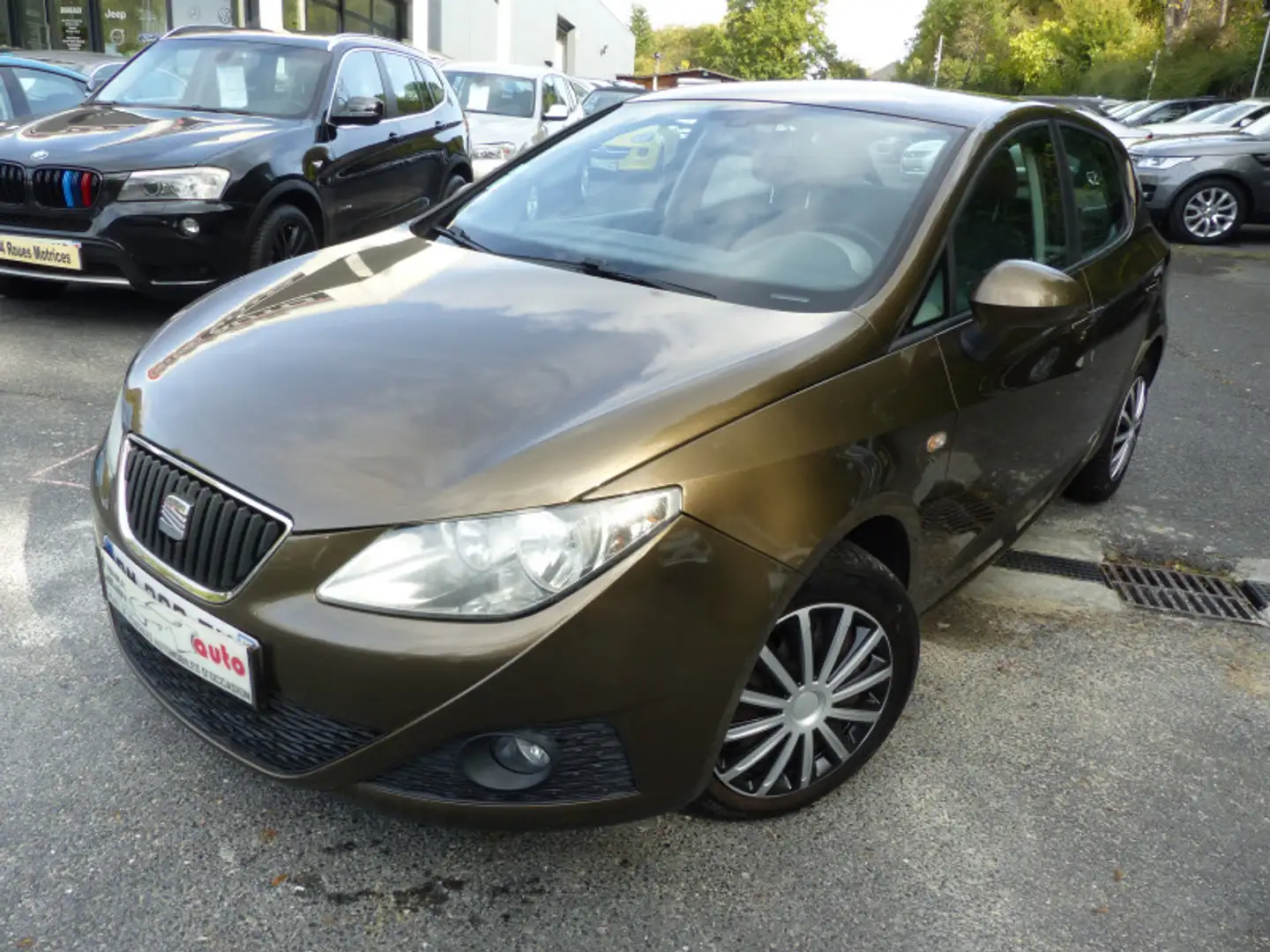 SEAT Ibiza 1.2 TSI STYLE DSG 5P Brun - 1