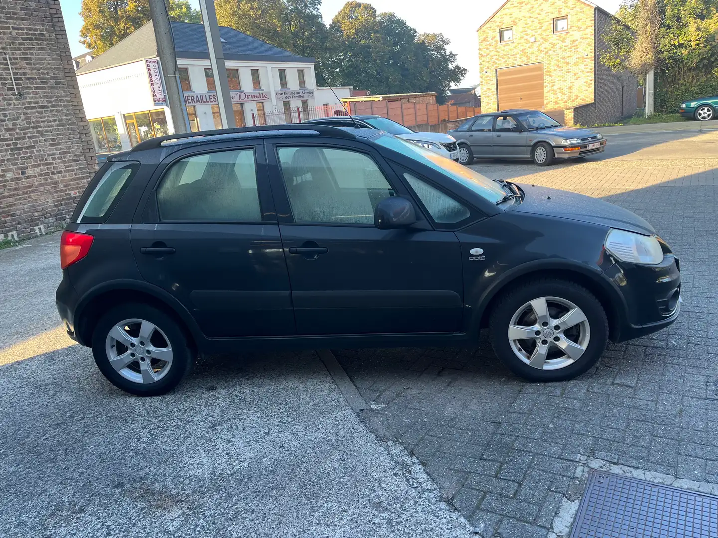 Suzuki SX4 SX4 1.6 DDiS GL Outdoor Pionier Schwarz - 1