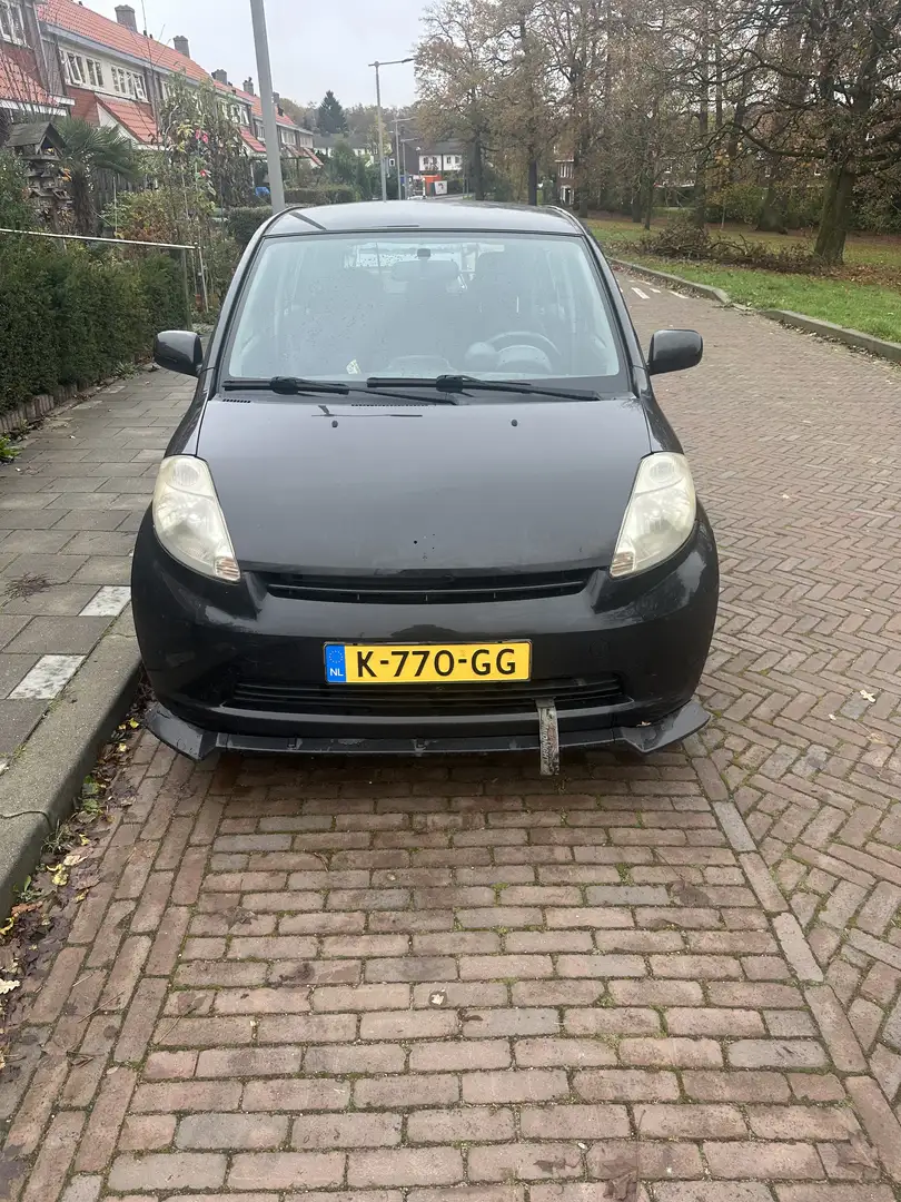 Daihatsu Sirion daihatsu sirion 2   1.3-16V Comfort Чорний - 2