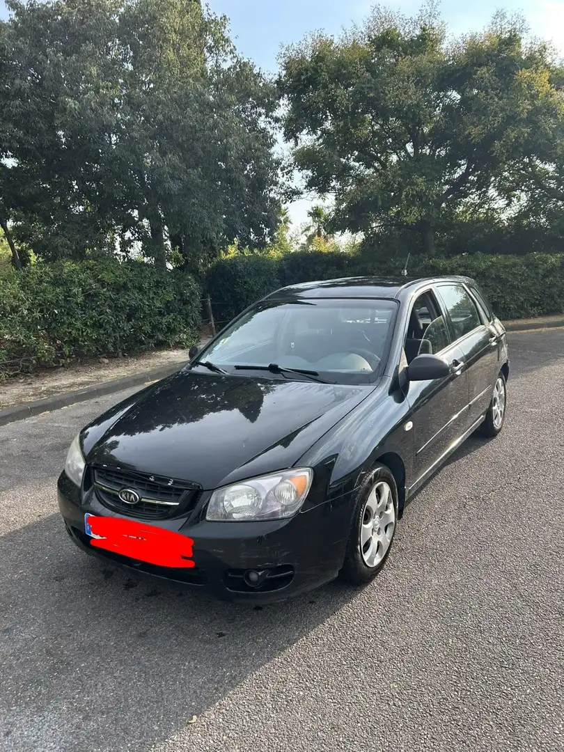 Kia Cerato 1.5 CRDi 102 EX Luxe - 1