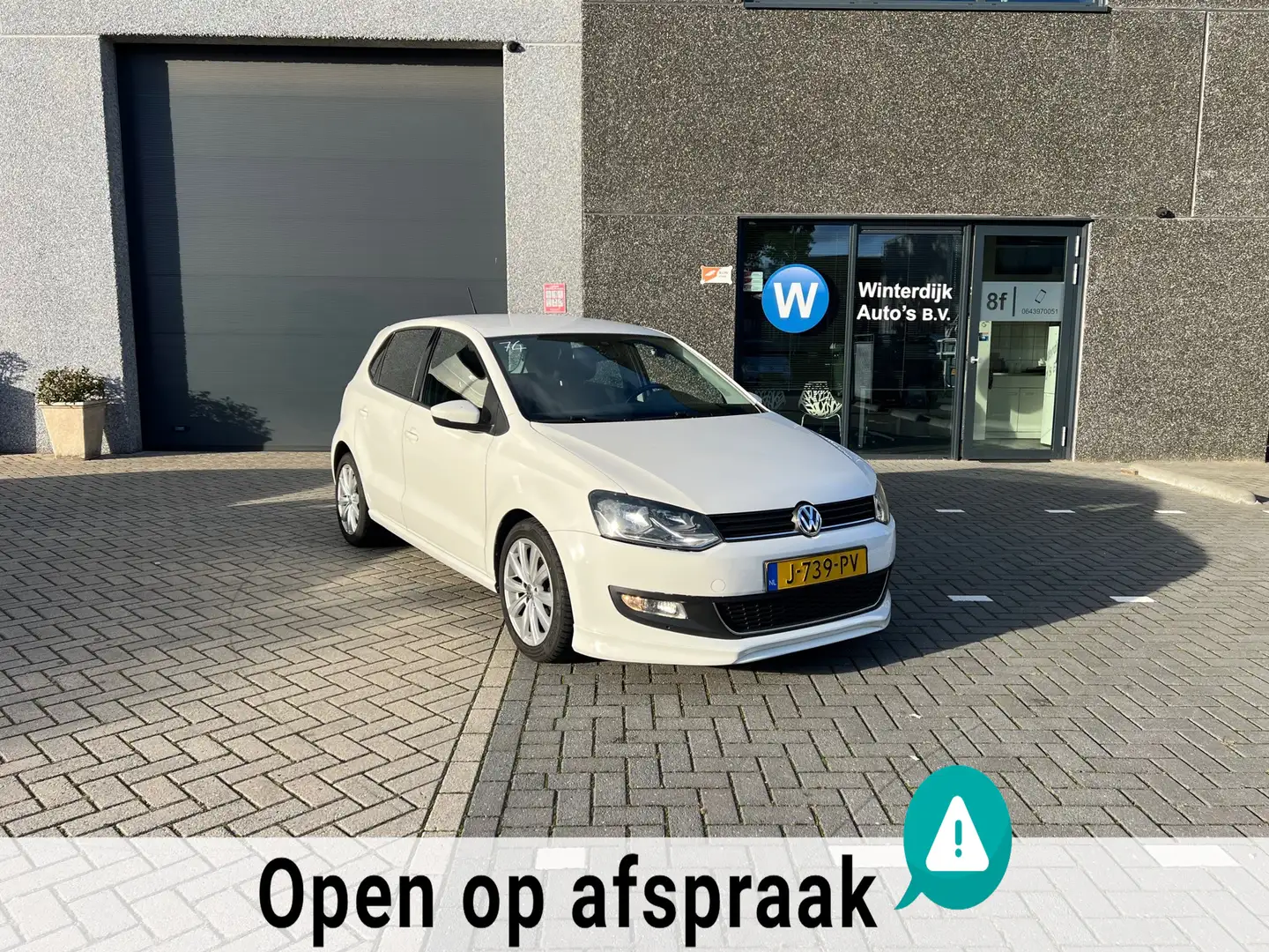 Volkswagen Polo 1.2 TSI Highline Airco|Cruise|PDC|Navigatie Wit - 1