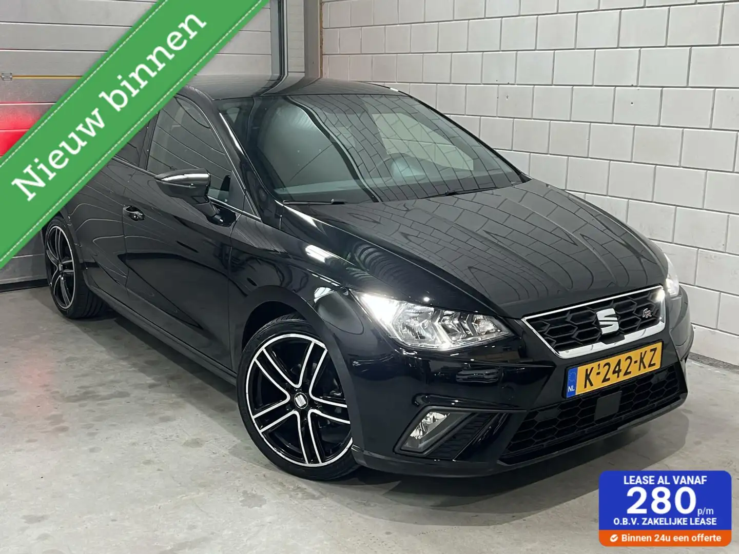 SEAT Ibiza 1.0 TSI FR*NAP*Apple Carplay*Cam*PDC*Cruise*Clima Zwart - 1