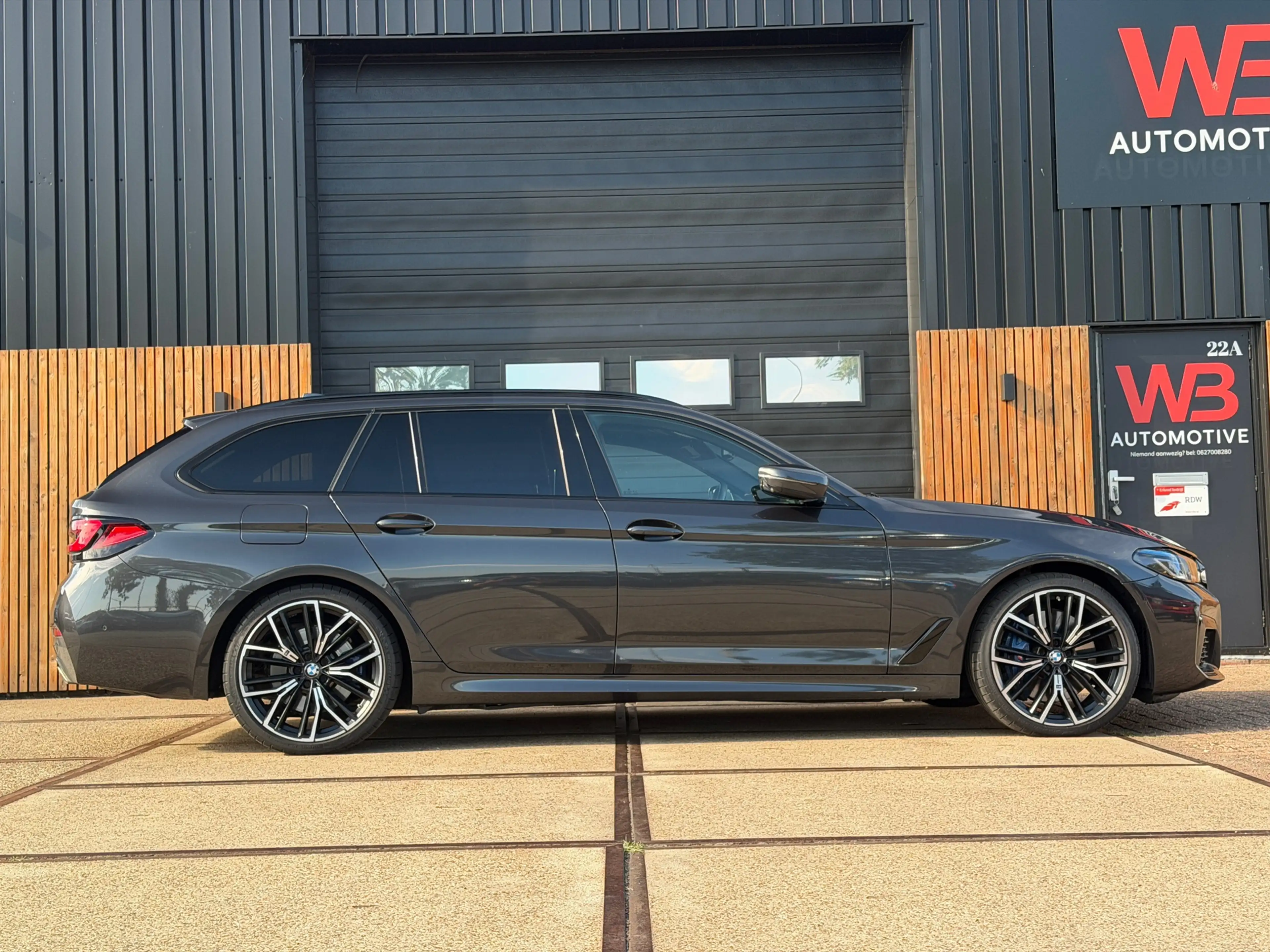 BMW 540 5-serie Touring 540d xDrive High Executive M-Sport — photo 12