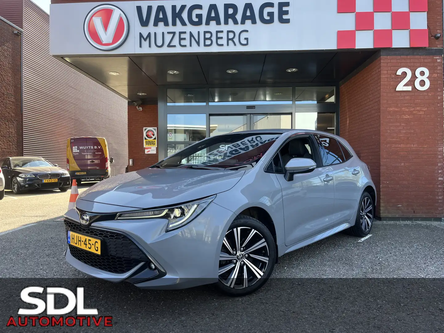 Toyota Corolla 1.8 Hybrid Dynamic // FULL LED // HALF LEDER // AD Gris - 1