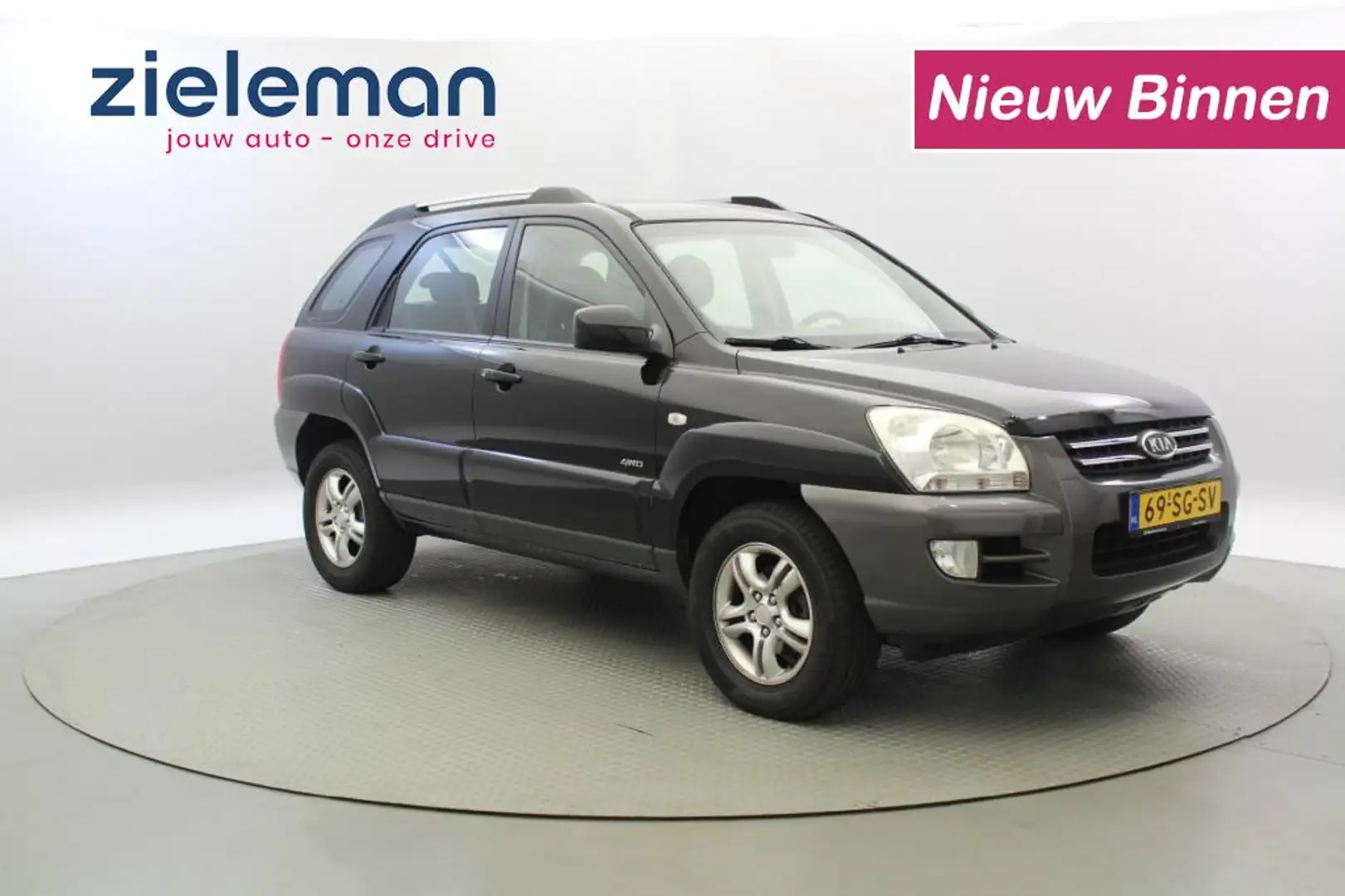 Kia Sportage 2.0 CVVT Comfort - Cruise, Clima, Trekhaak Zwart - 1