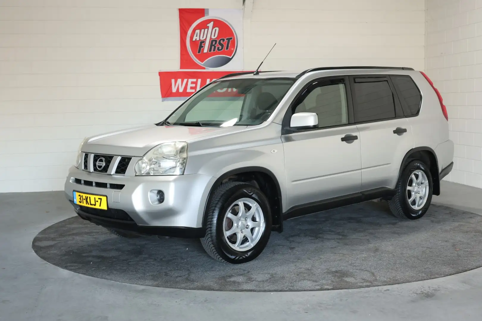 Nissan X-Trail 2.0 XE 4WD 2e Eig. NL auto, Boekjes, Bovengemiddel Gris - 1