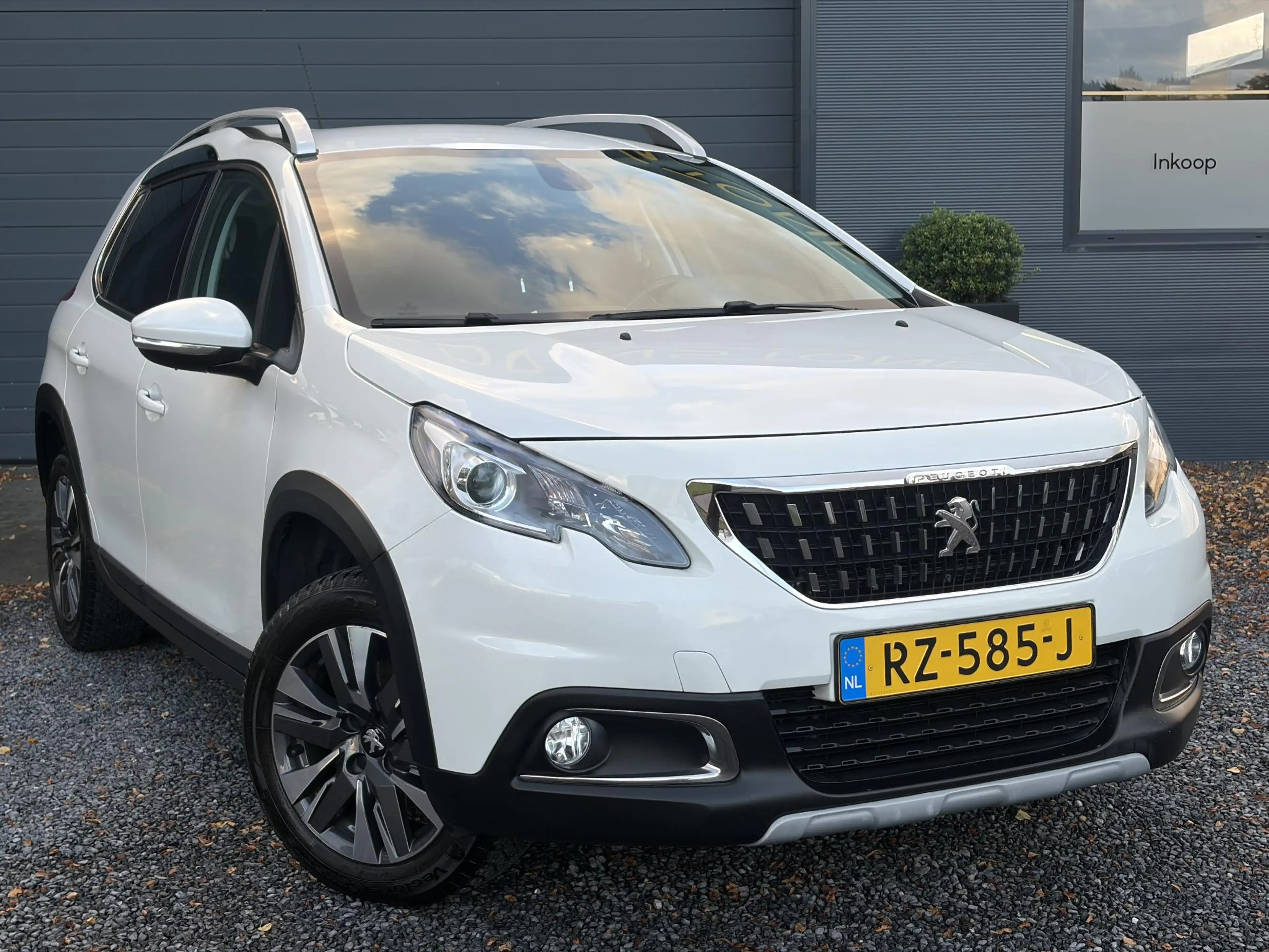 Peugeot 2008 1.2 PureTech Allure ✓Camera✓Navi✓Carplay✓Halfleder — photo 2