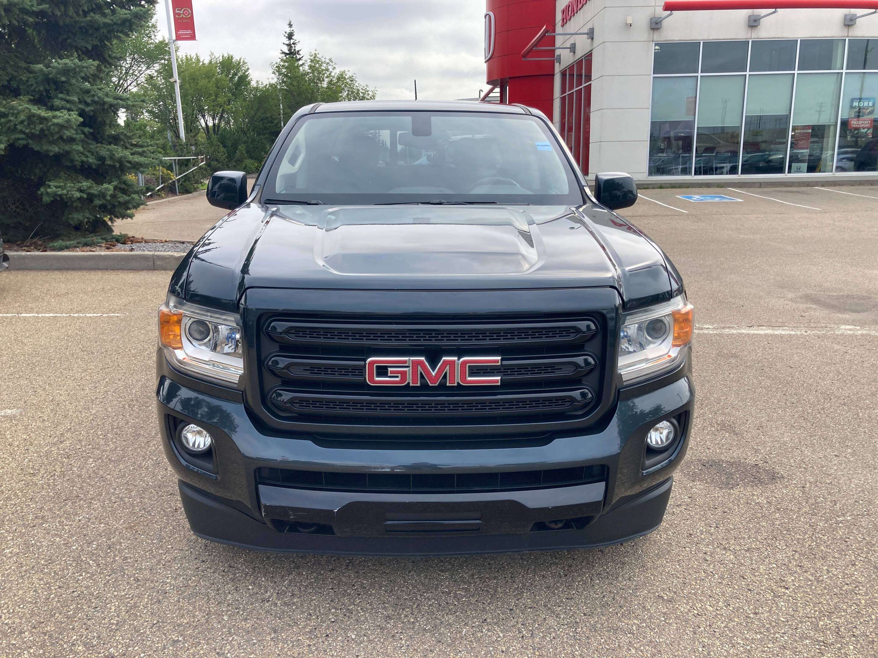 used 2018 GMC Canyon car, priced at $32,900