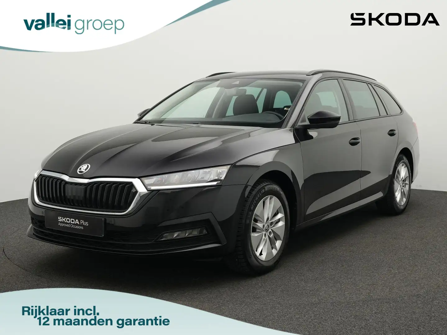 Skoda Octavia Combi 1.0 TSI 110 pk Business Edition | Navigatie Zwart - 1