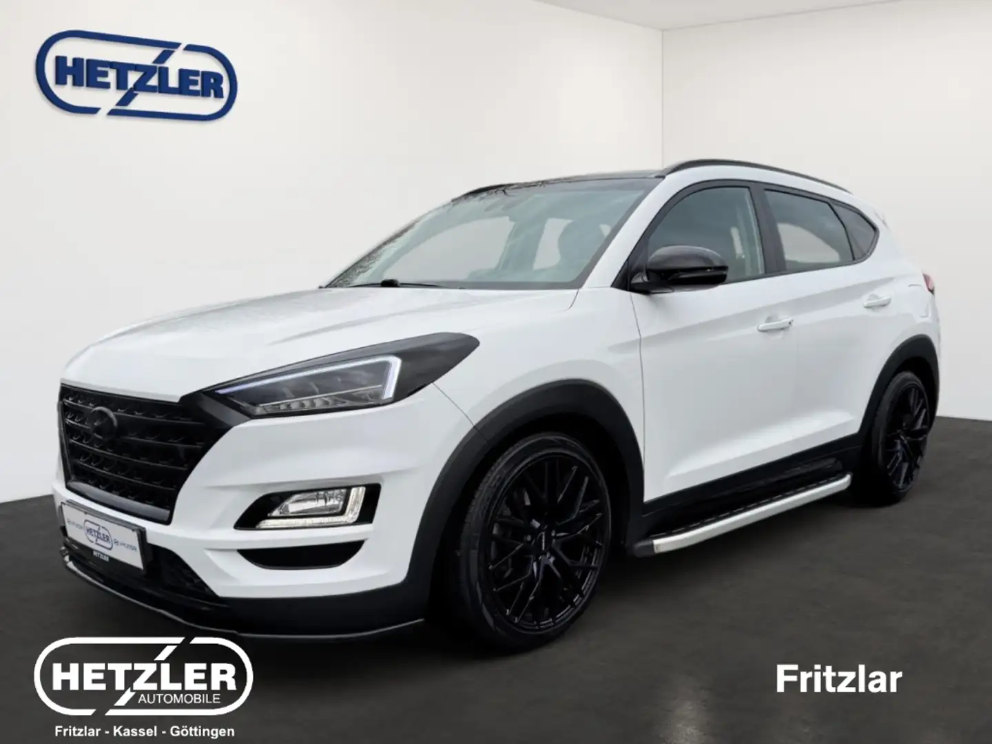 Hyundai TUCSON Style 2WD El. Panodach Navi Mehrzonenklima DAB SD Blanc - 1