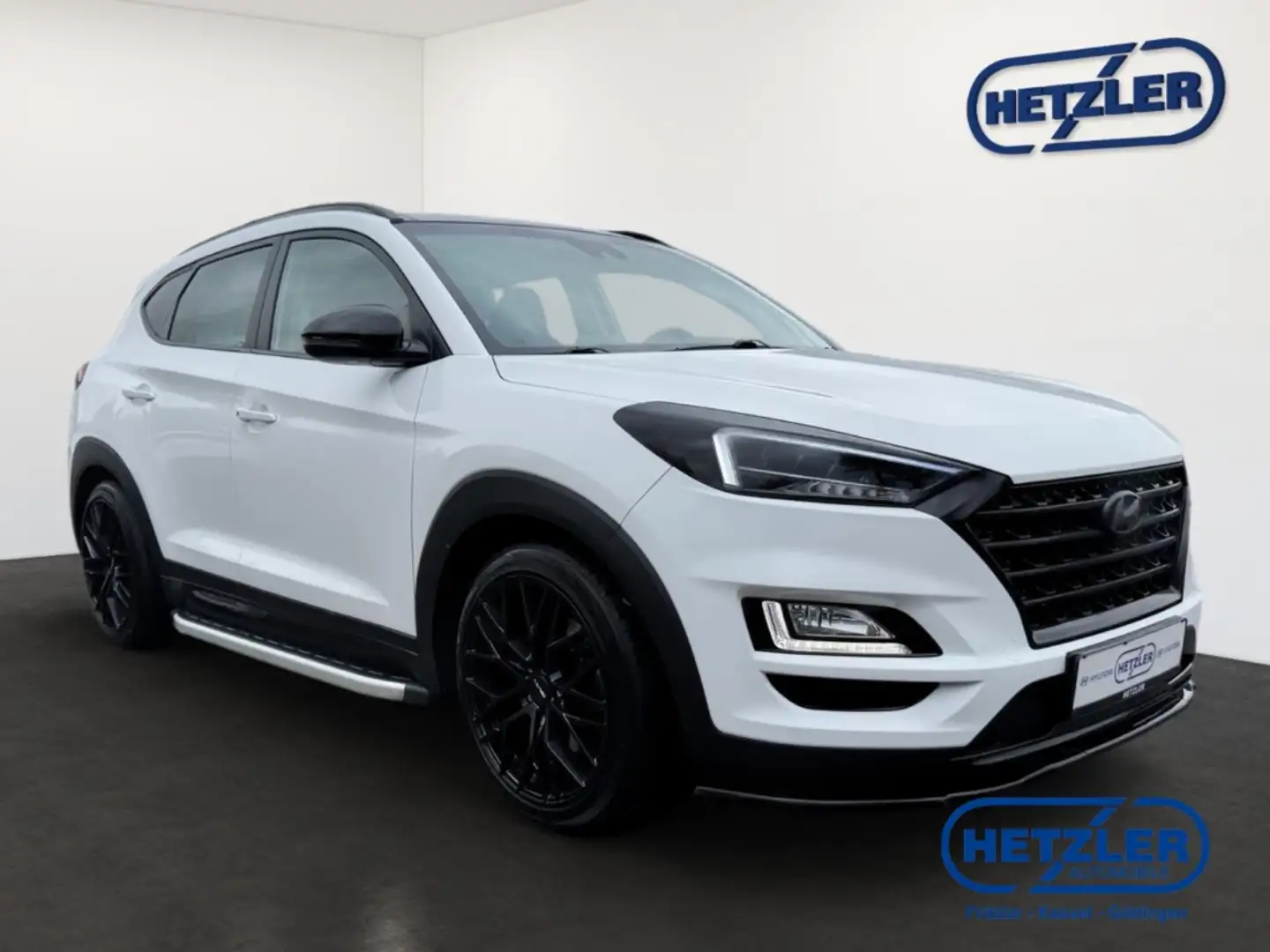 Hyundai TUCSON Style 2WD El. Panodach Navi Mehrzonenklima DAB SD Blanc - 2