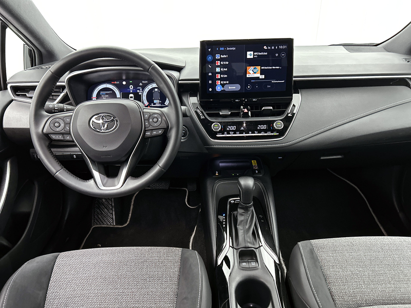 Toyota Corolla Touring Sports Hybrid 140 Dynamic | NL-Auto | Park — photo 4