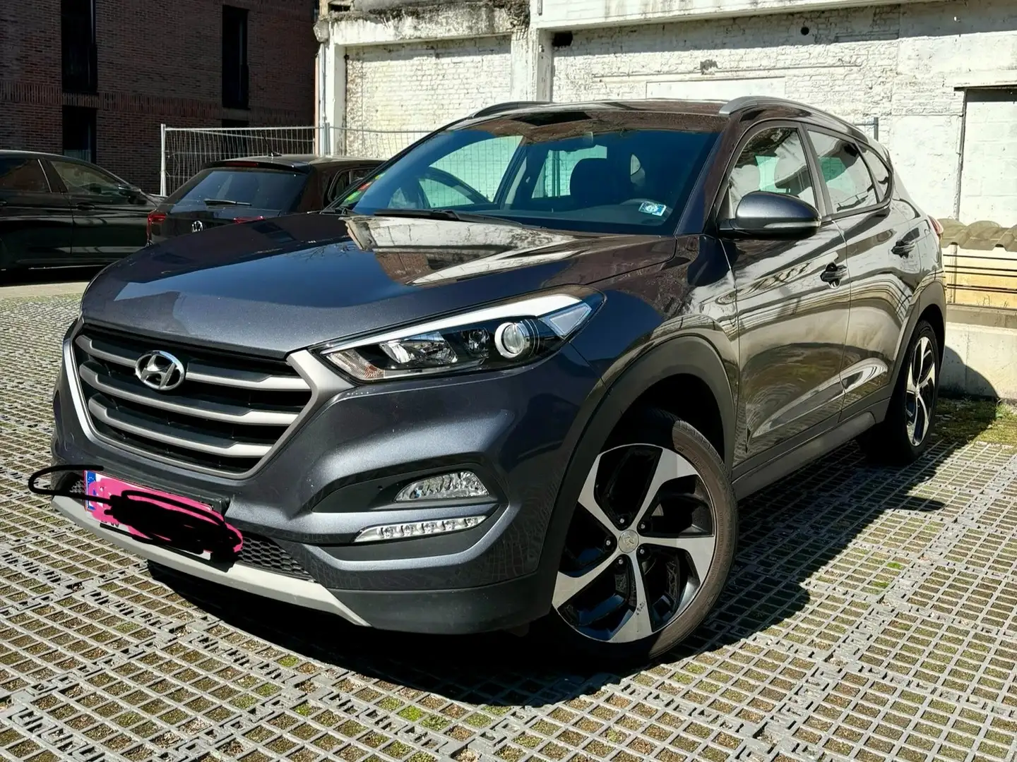 Hyundai TUCSON 1.6 GDi 2WD Premium ISG Grijs - 1