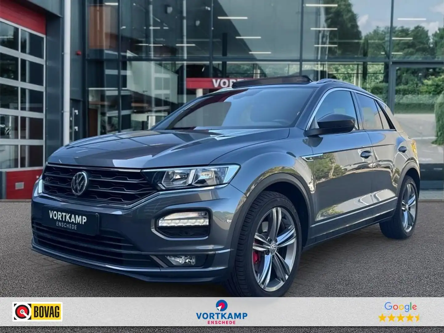 Volkswagen T-Roc 1.5 TSI DSG R-LINE PANO-DAK/TREKHAAK/NAVI/ACC/STOE Grijs - 1