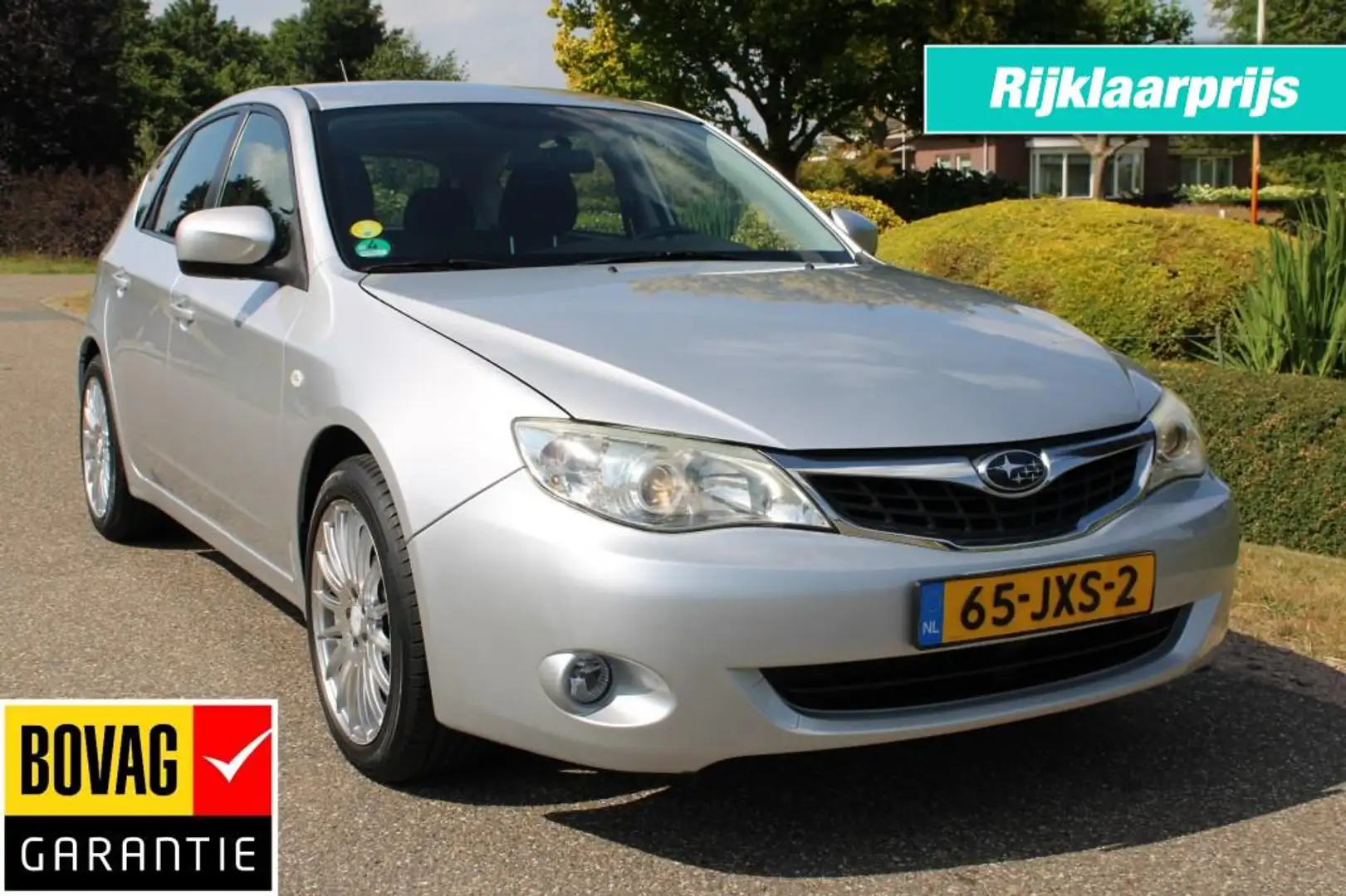 Subaru Impreza 1.5R 107pk Luxury 5-drs ECC/Cruise/PDC/Stoelverwar Grijs - 1