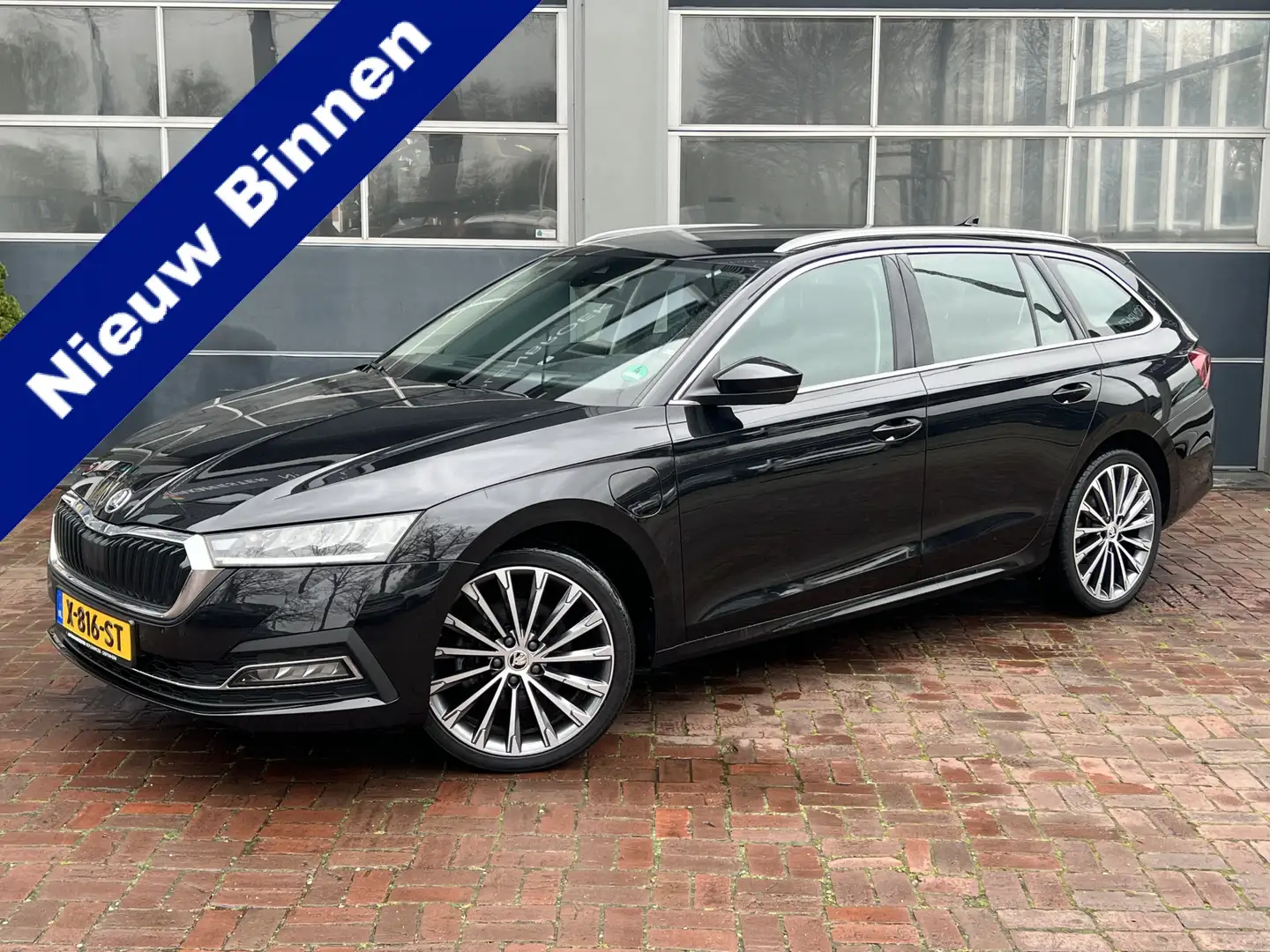 Skoda Octavia Combi iV PHEV | Stoelverwarming | Memory L+R 07-20 Zwart - 1