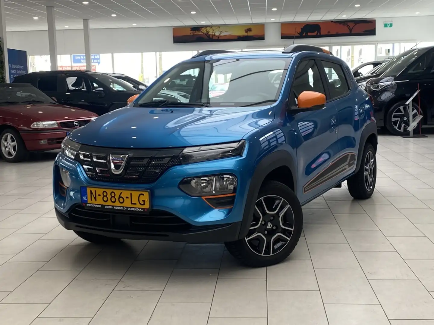 Dacia Spring Comfort+ (Orange p.) [ APPLE CARPLAY & ANDROID AUT Blauw - 1